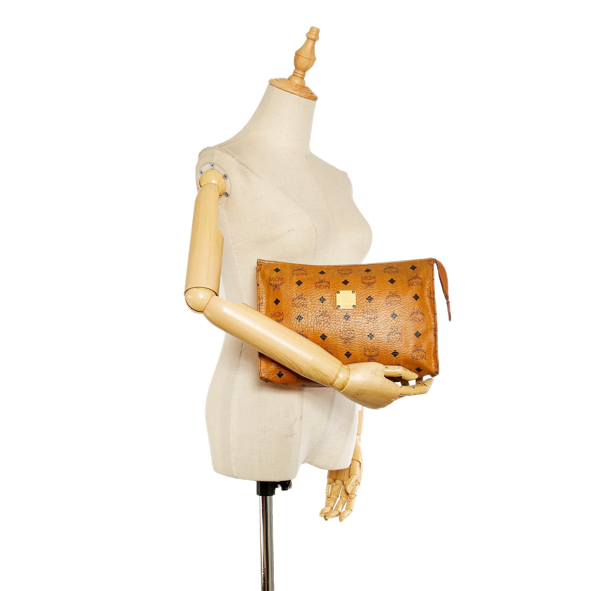 MCM Visetos Leather Clutch Bag (SHG-27525)