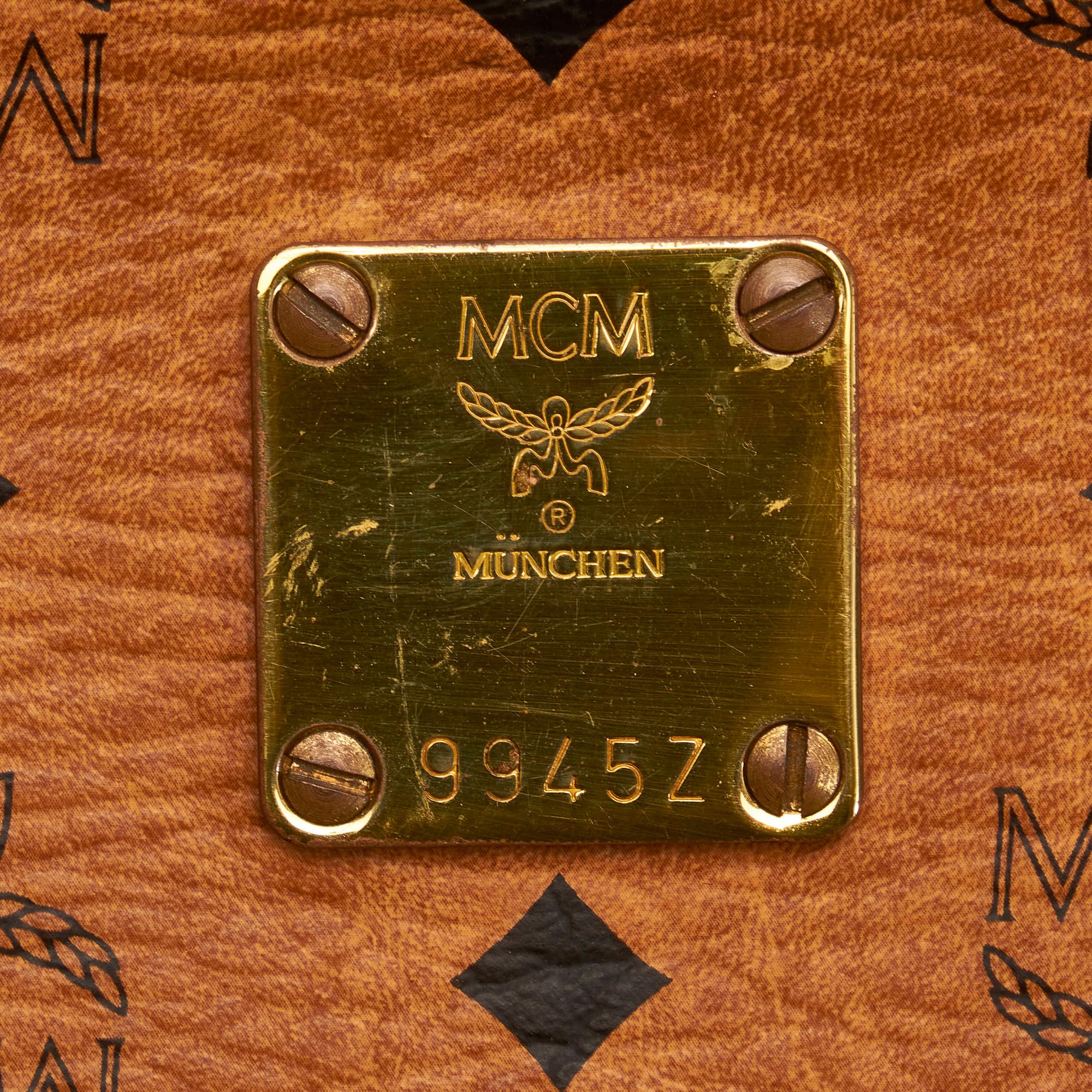 MCM Visetos Leather Clutch Bag (SHG-27806)