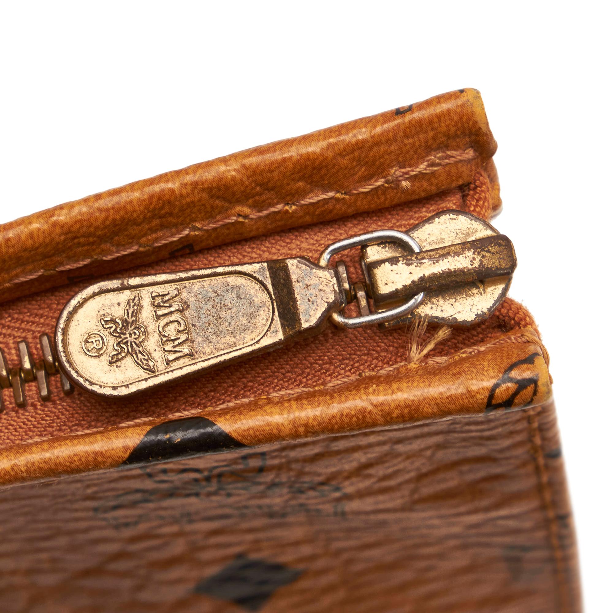 MCM Visetos Leather Clutch Bag (SHG-27806)