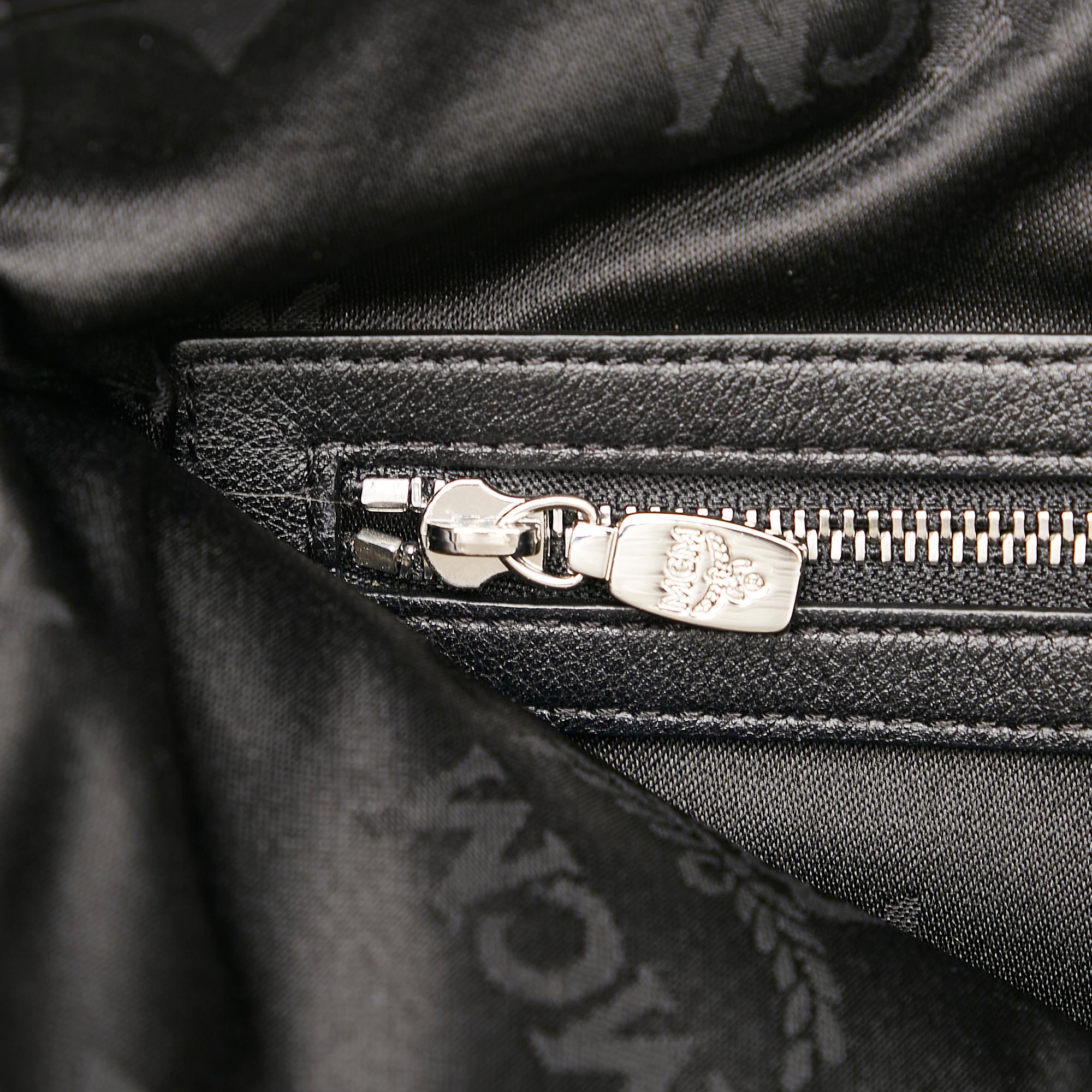 MCM Visetos Leather Clutch Bag (SHG-28412)