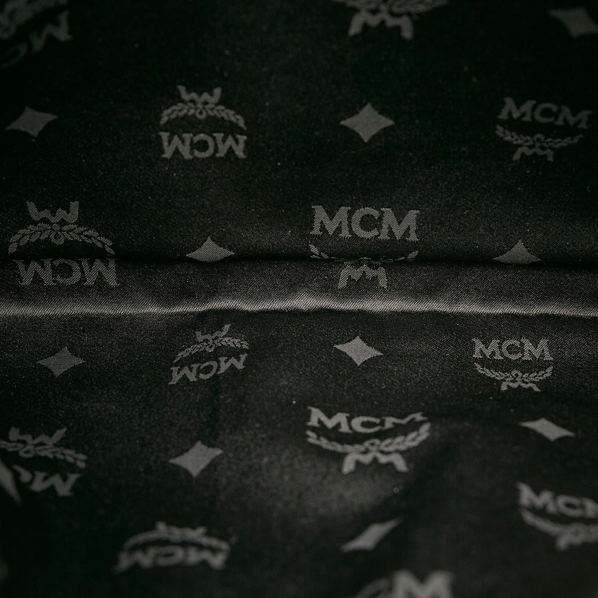 MCM Visetos Leather Clutch Bag (SHG-28412)