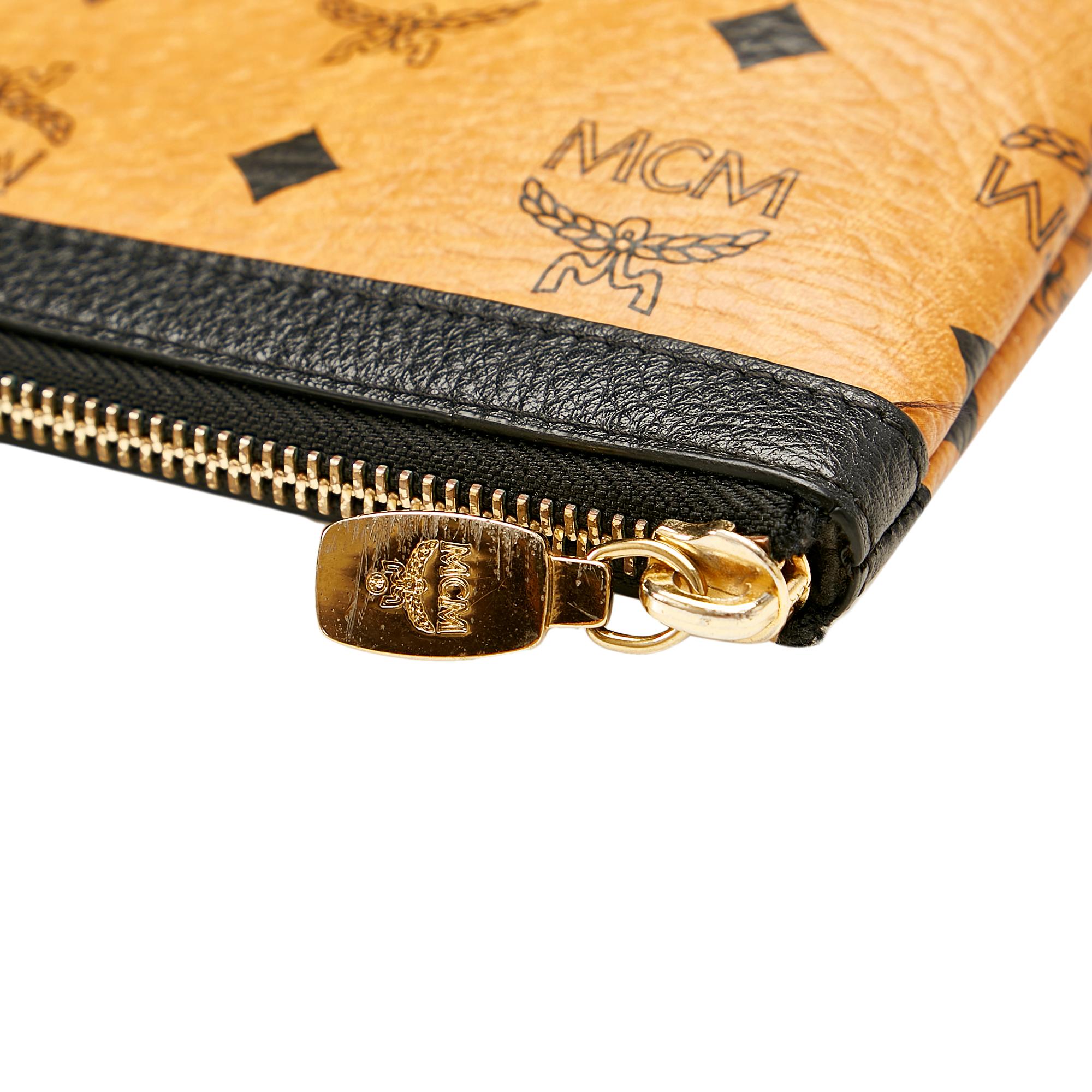 MCM Visetos Leather Clutch (SHG-25243)