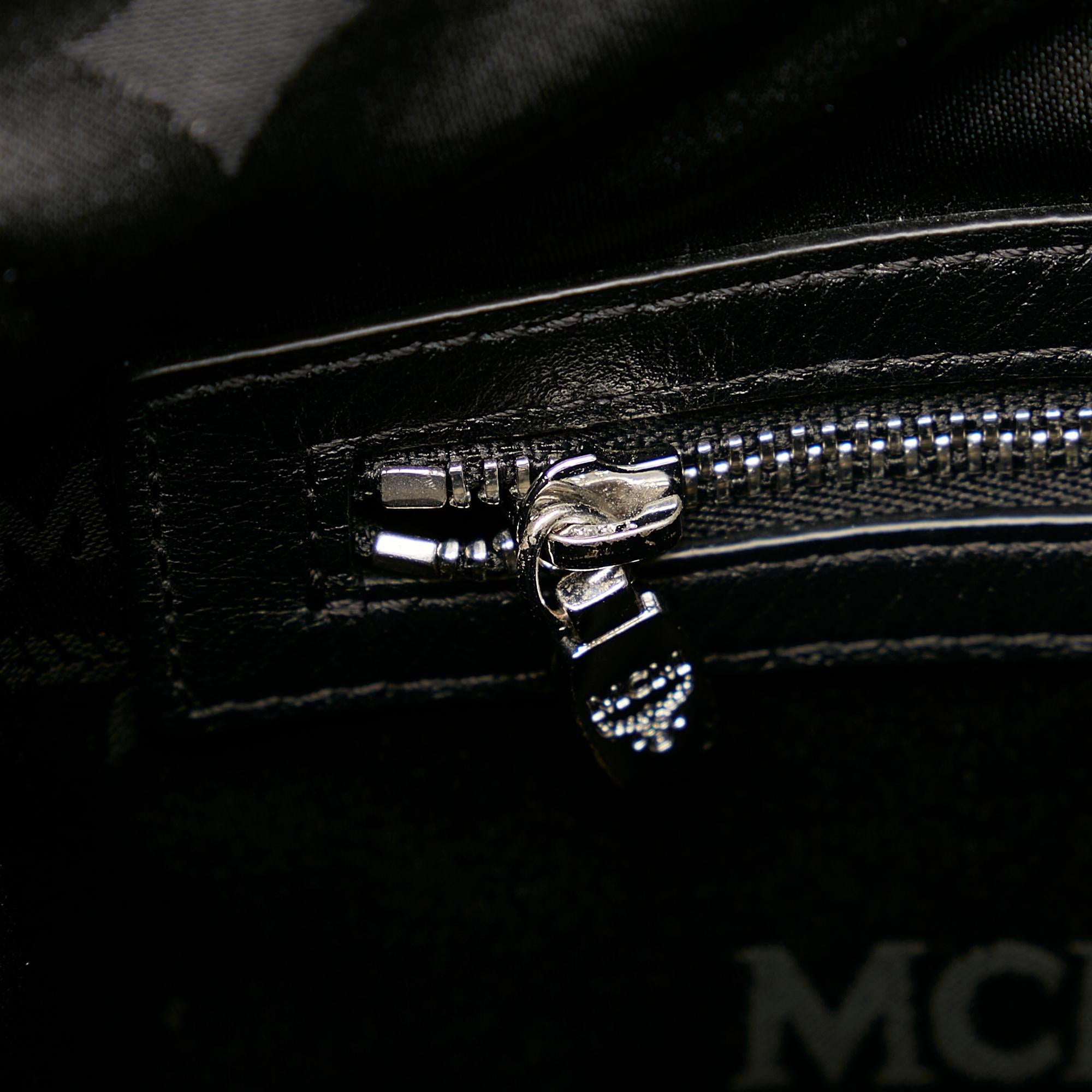 MCM Visetos Leather Clutch (SHG-27508)