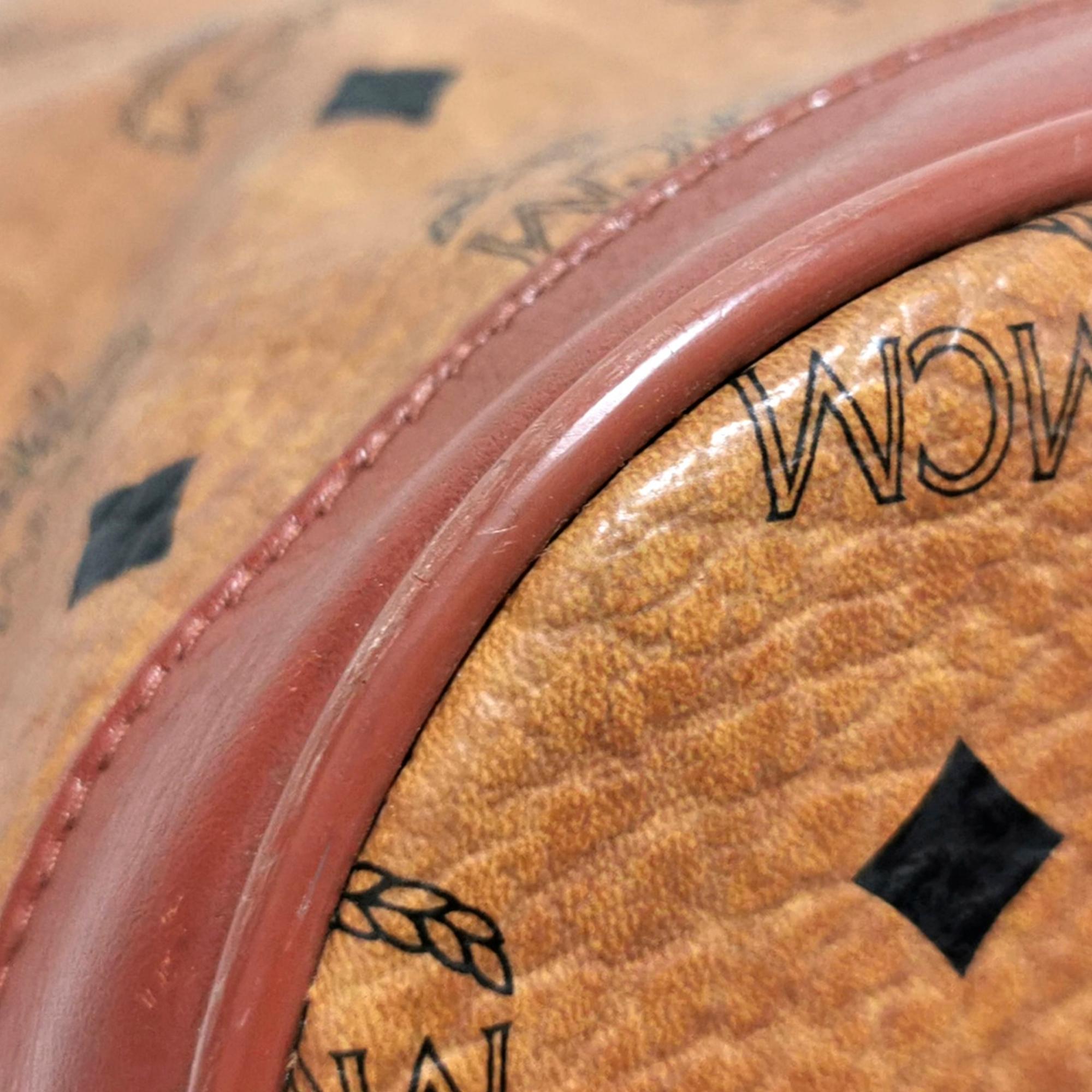 MCM Visetos Leather Drawstring Bucket Bag (SHG-28152)