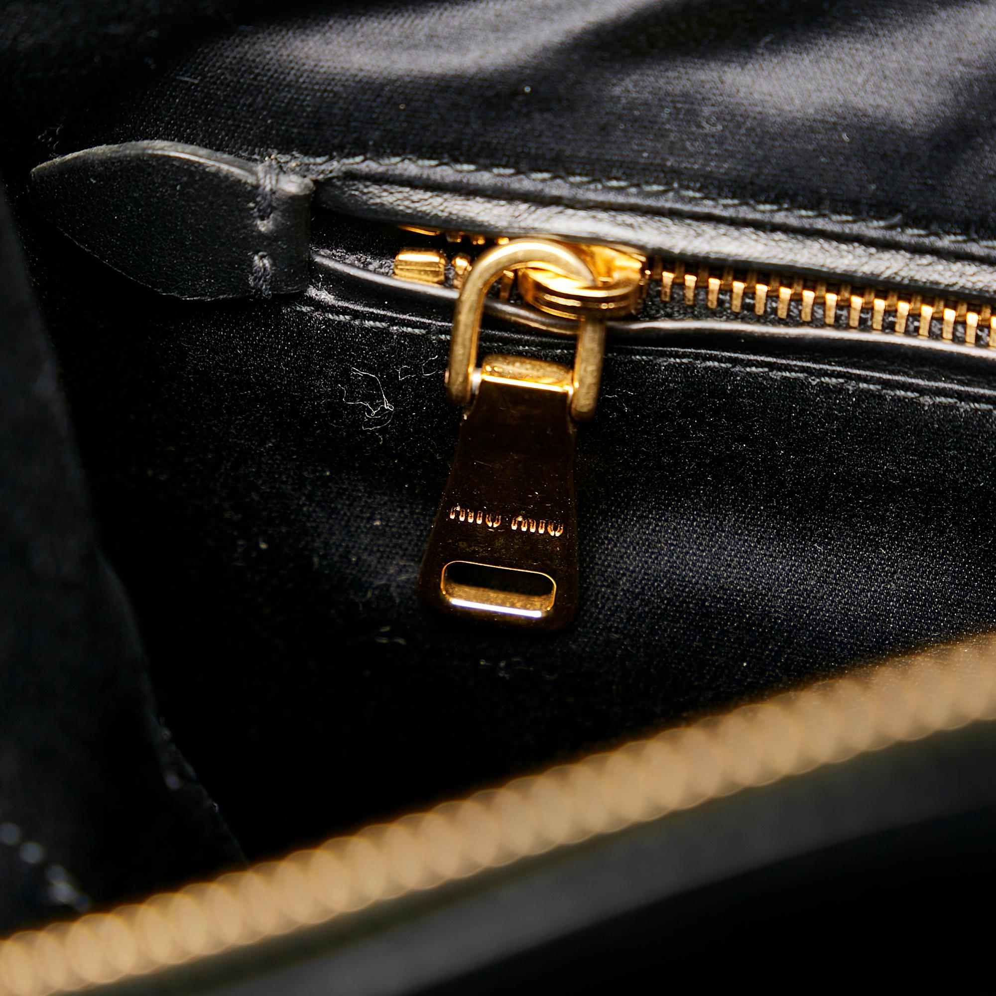 Miu Miu Studded Leather Clutch Bag (SHG-29355)