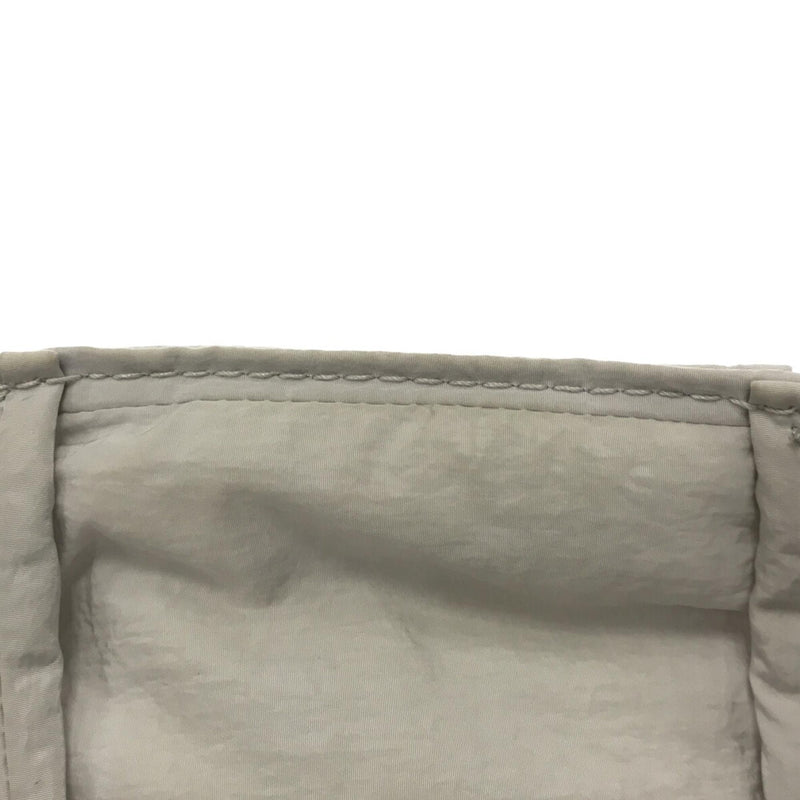 Bottega Veneta Padded Tech Cassette Crossbody Bag (SHG-qvTn6P)