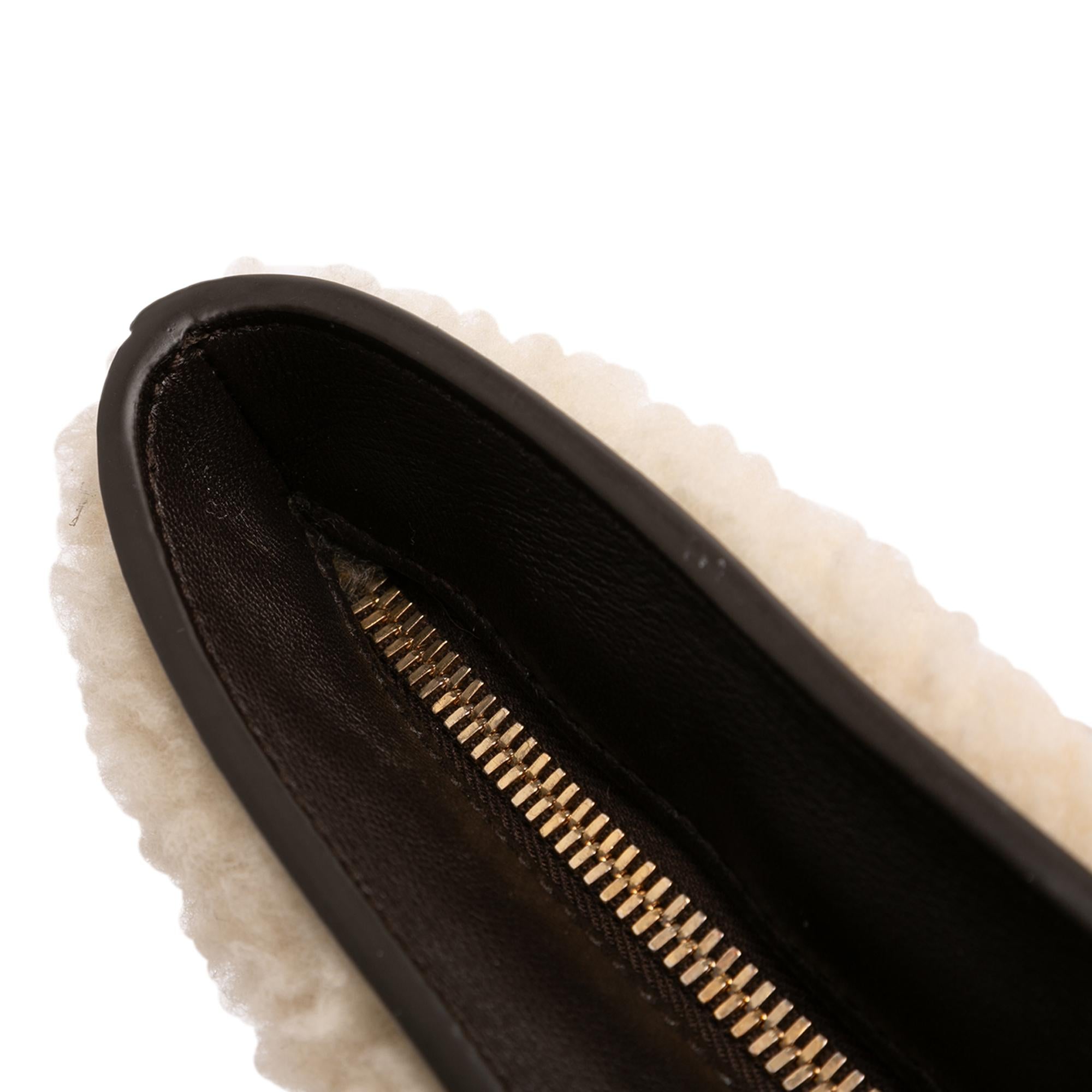 Bottega Veneta Shearling Trimmed Leather Clutch