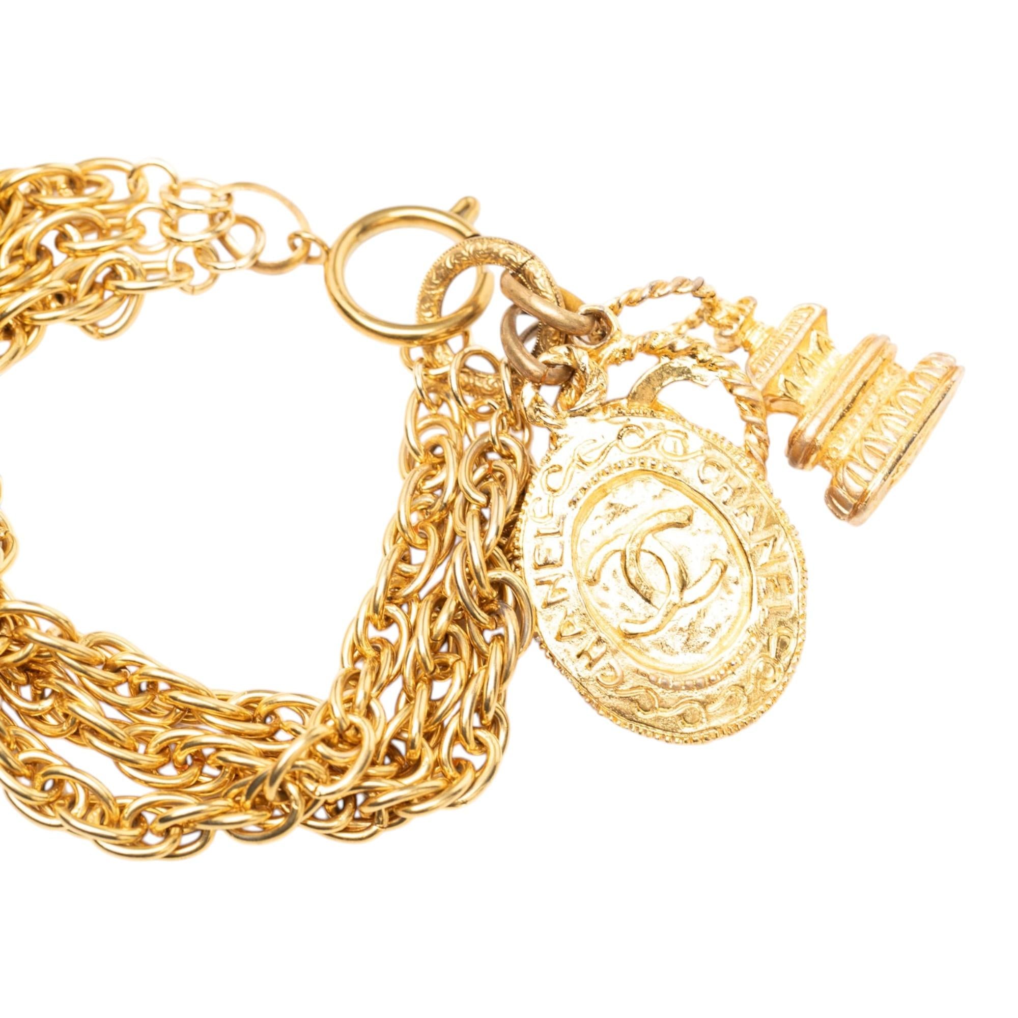 Chanel CC Gold Plated Triple Chain Logo Charm Bracelet