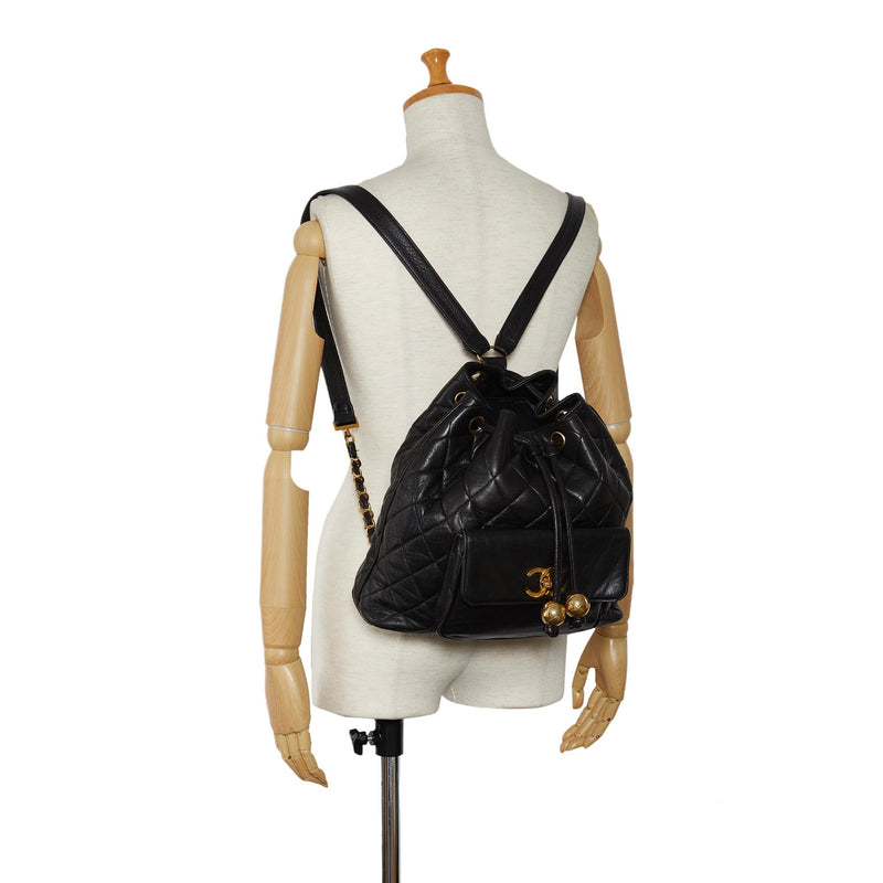 Chanel CC Quilted Lambskin Drawstring Backpack SHG 86DOIB LuxeDH