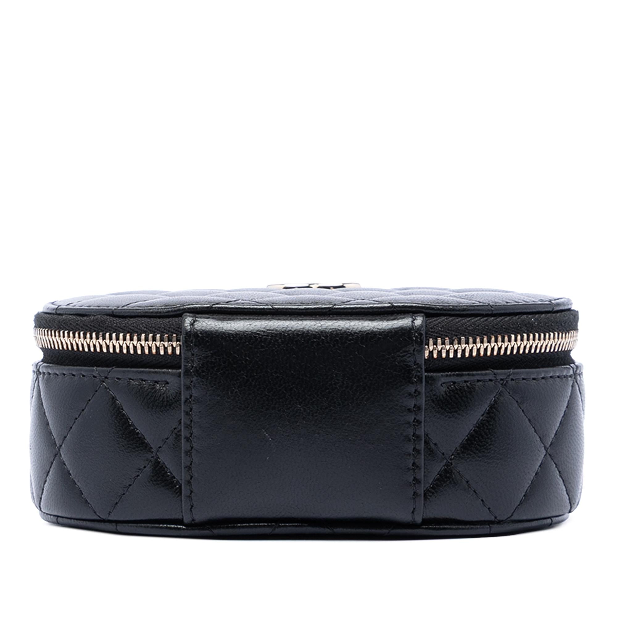 Chanel CC Quilted Lambskin Oval Top Handle Clutch