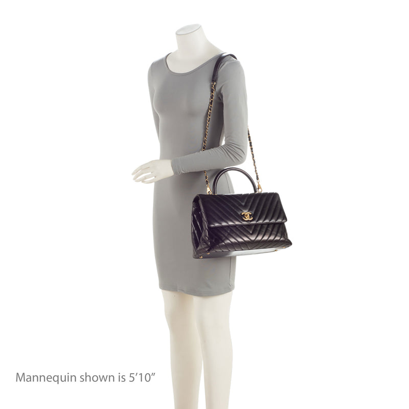 Chanel chevron flap bag with top handle deals