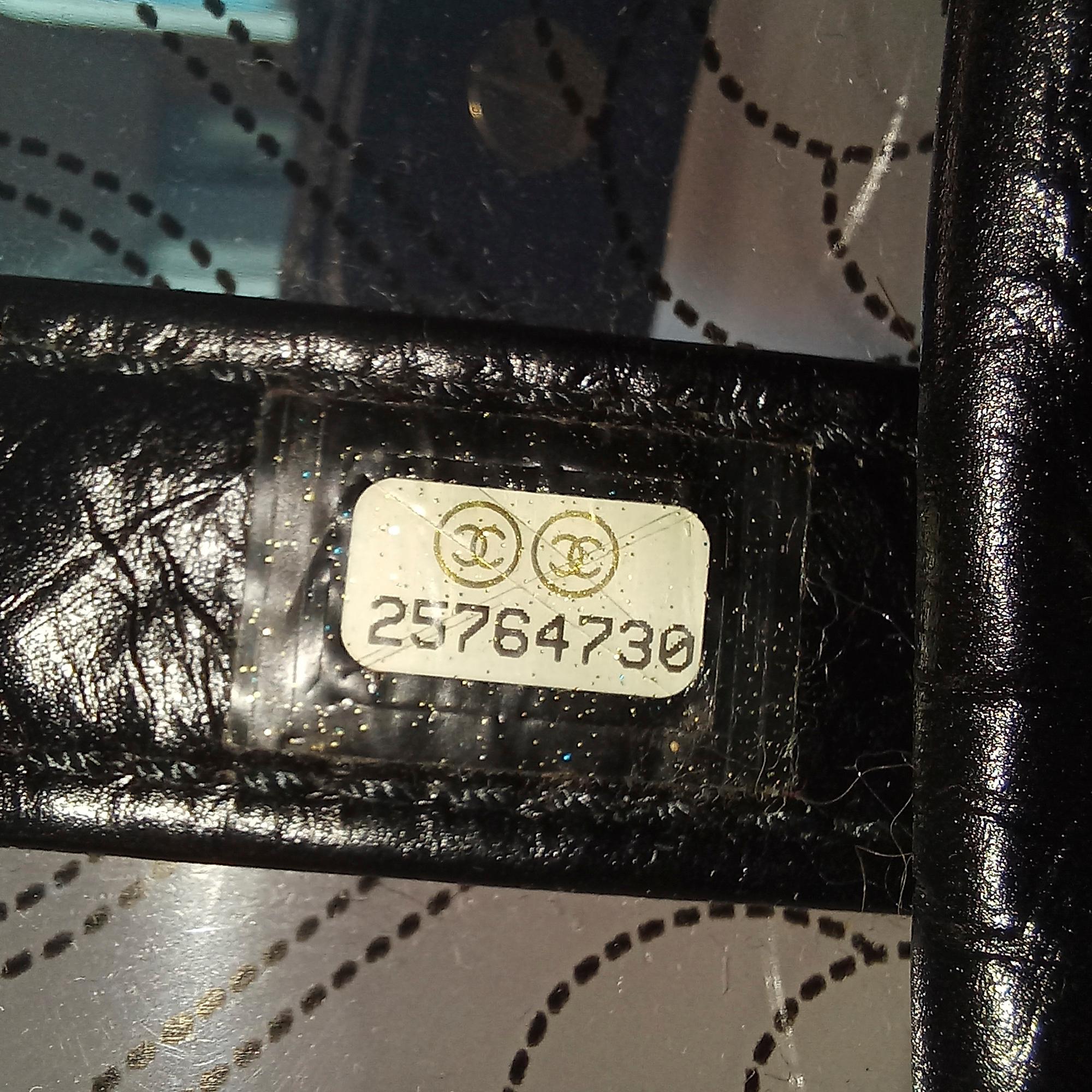 Chanel Crumpled Calfskin PVC Camellia Bucket