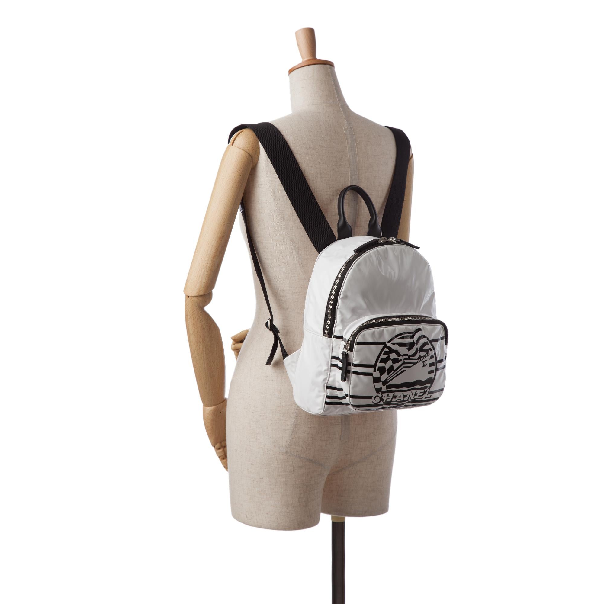 Chanel La Pausa Vinyl Backpack (SHG-8DJhRs)