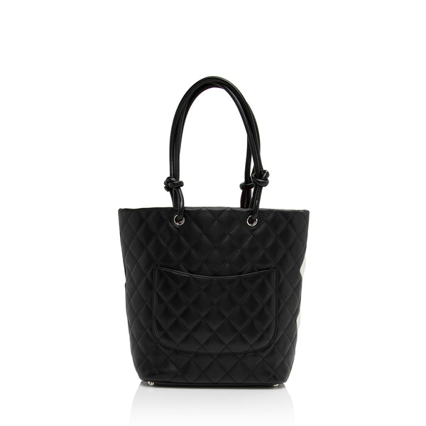 Snag the Latest CHANEL Women's Bags & CHANEL Cambon with Fast and Free  Shipping. Authenticity Guaranteed on Designer Handbags $500+ at .
