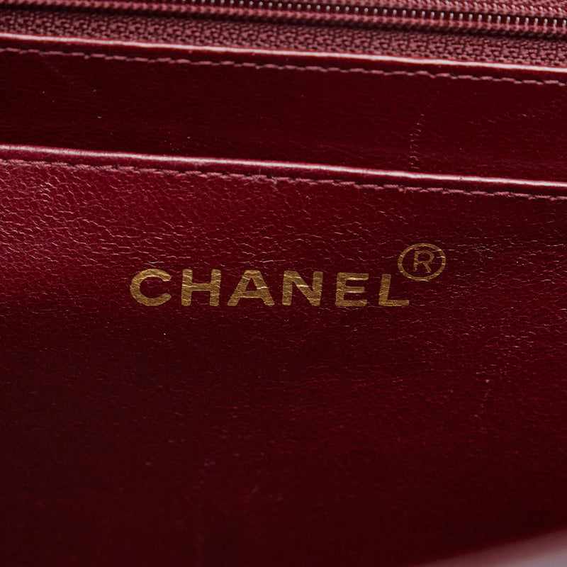 Chanel Maxi Classic Lambskin Single Flap (SHG-7MuYXe)