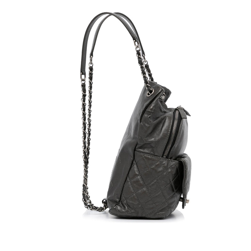 Chanel Medium CC Lambskin Drawstring Flap Backpack (SHG-rggGda) – LuxeDH