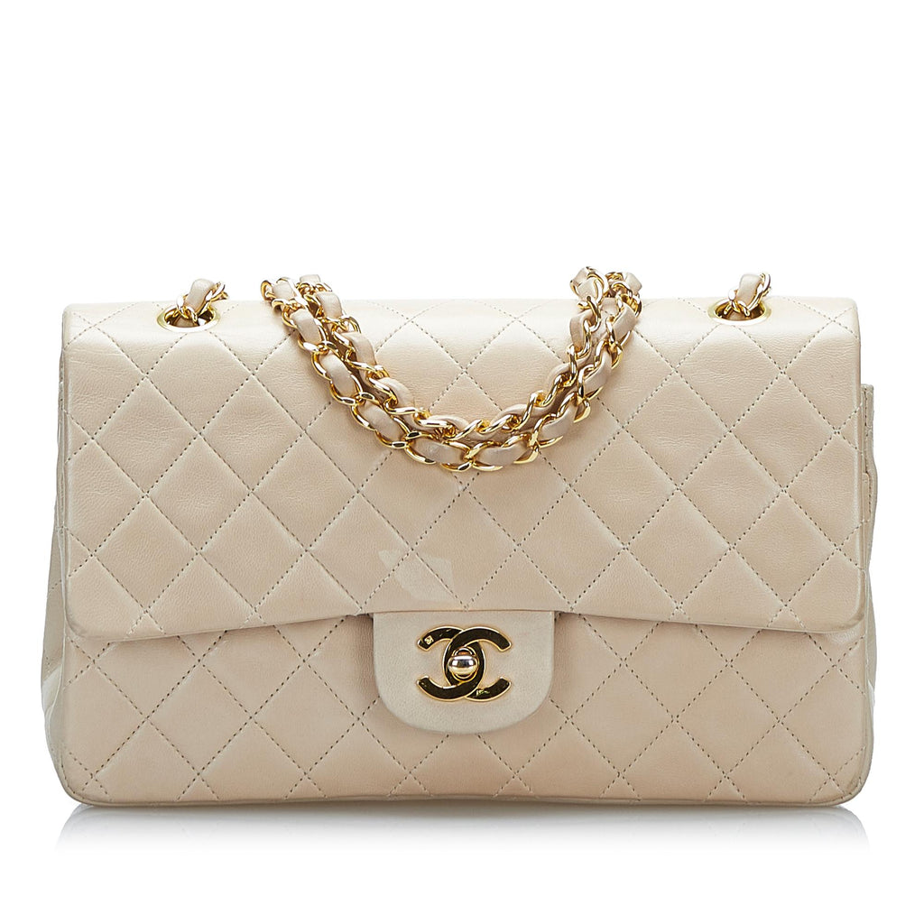 chanel gold quilted bag