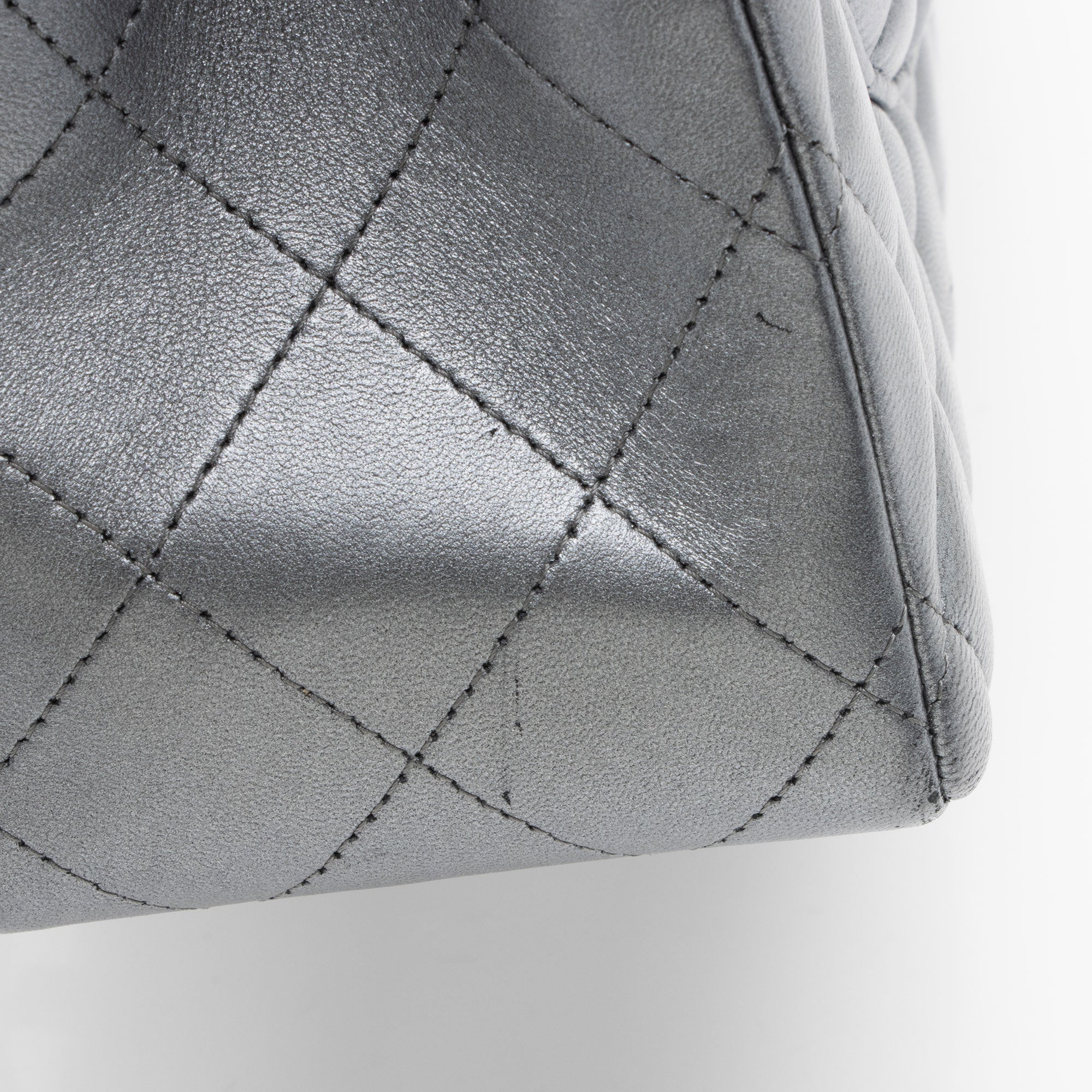 Chanel Metallic Lambskin Classic Maxi Double Flap Bag