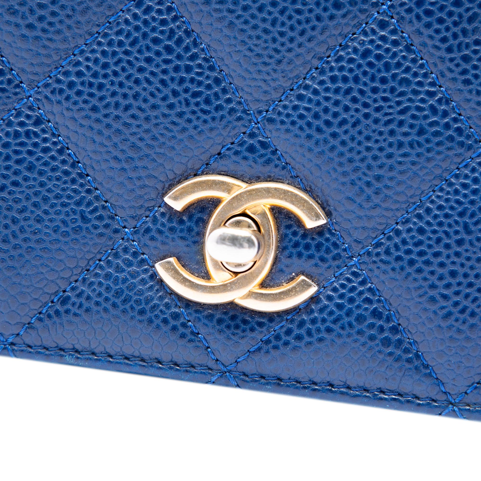 Chanel Mini Quilted Caviar Carry Around Flap