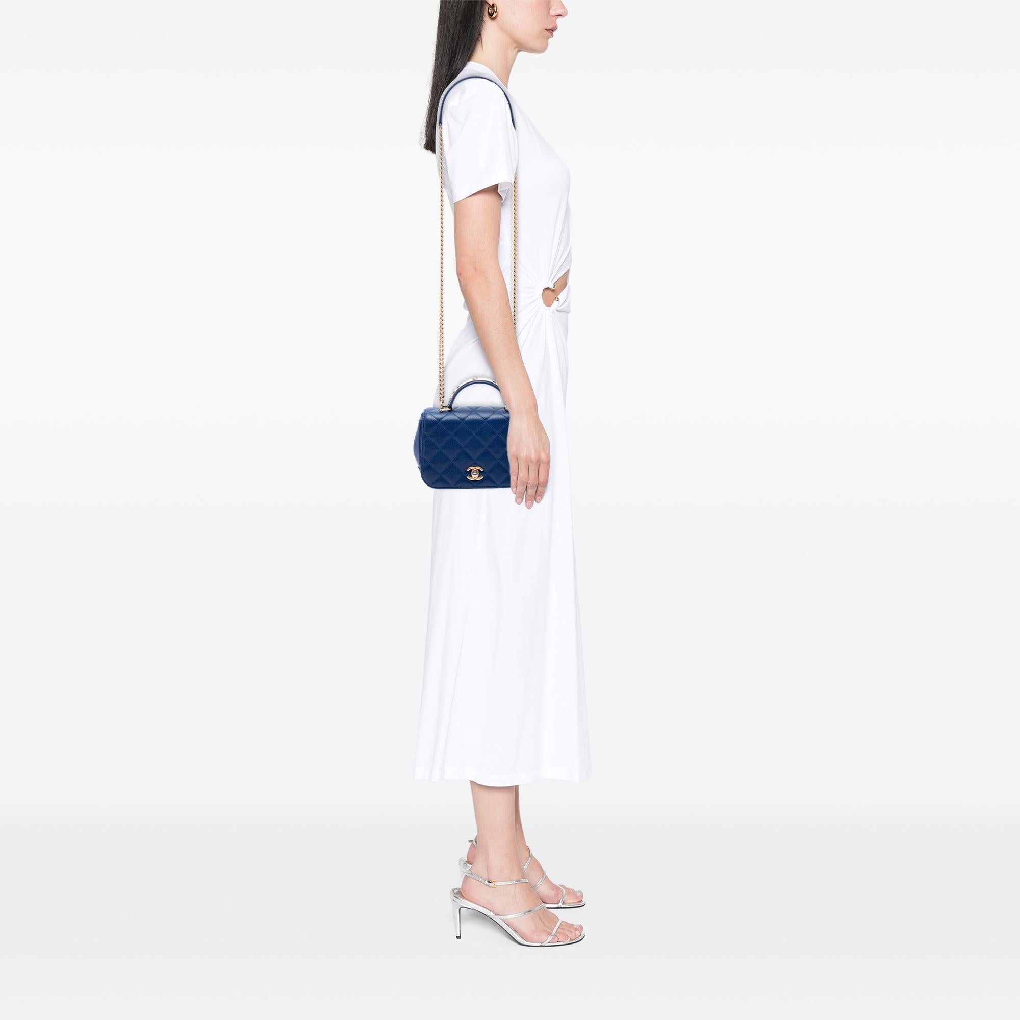 Chanel Mini Quilted Caviar Carry Around Flap