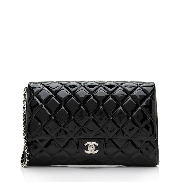 Chanel Wallet on Chain (WOC) shoulder bag in black quilted patent
