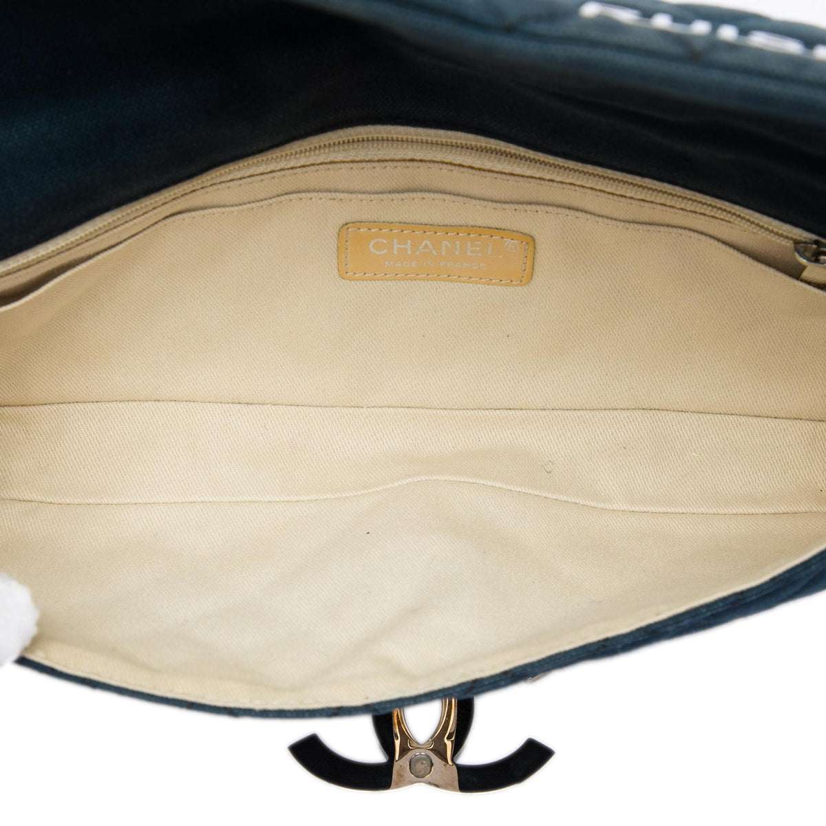 Chanel Quilted Canvas CC Cruise East West Flap Clutch