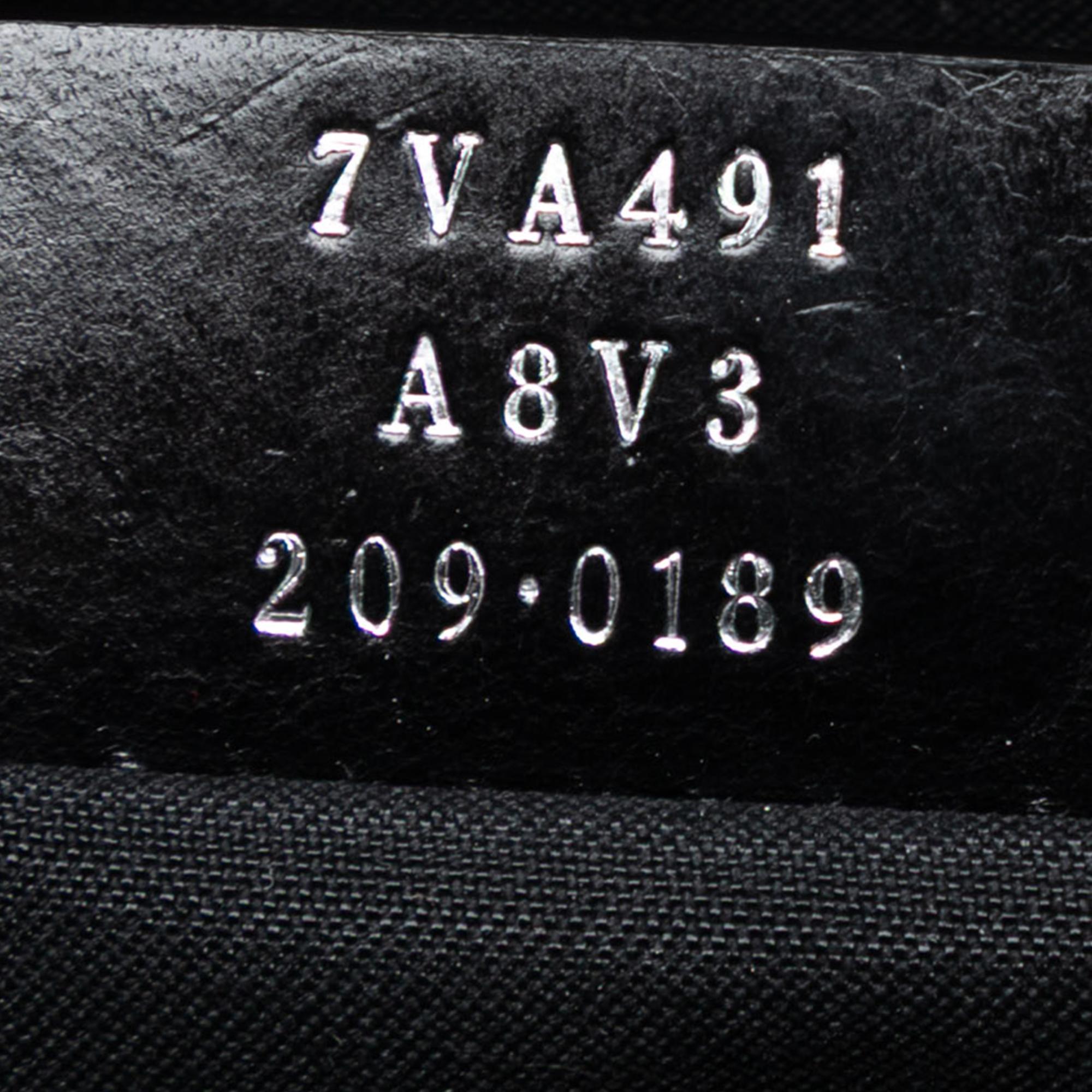Fendi Studded Leather Trimmed Zucca Coated Canvas Clutch