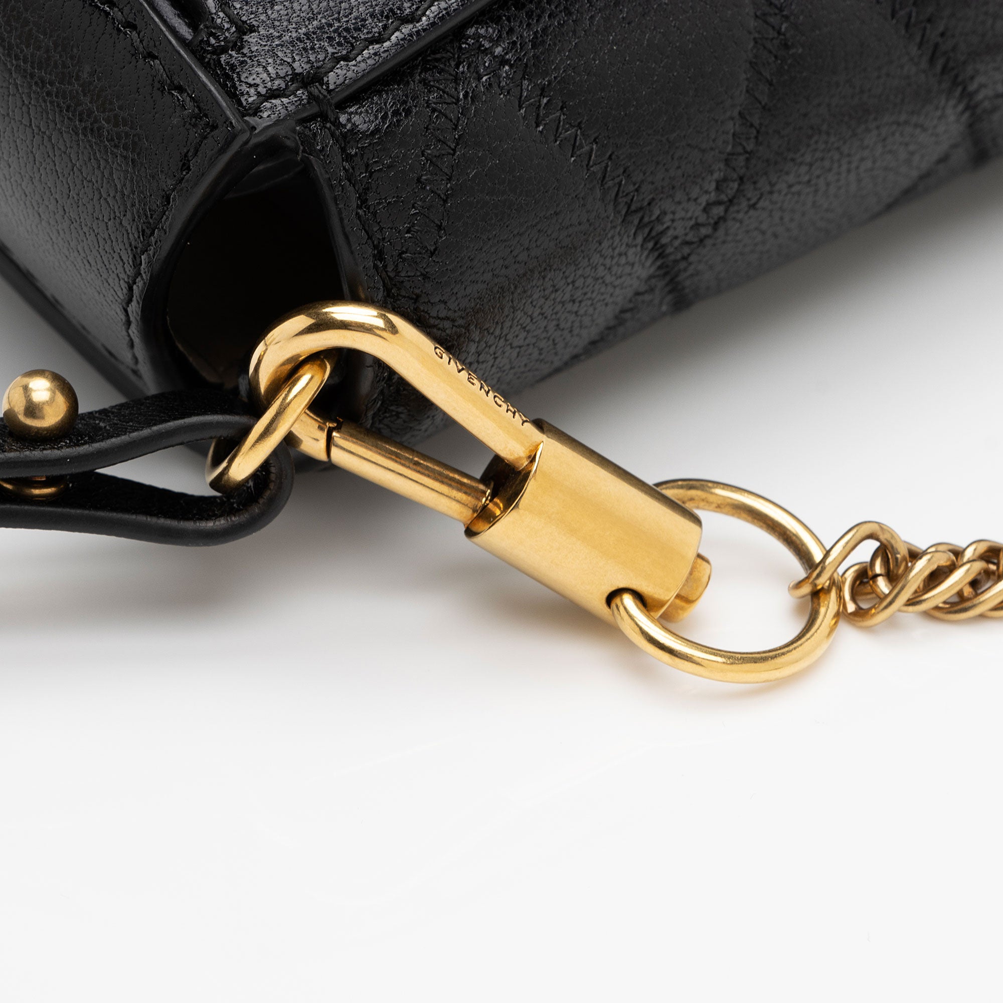 Givenchy Quilted Goatskin GV3 Pocket Mini Convertible Pouch (SHF-siLFsv)