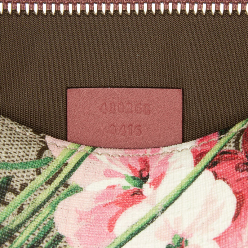 Gucci blooms clutch bag hotsell