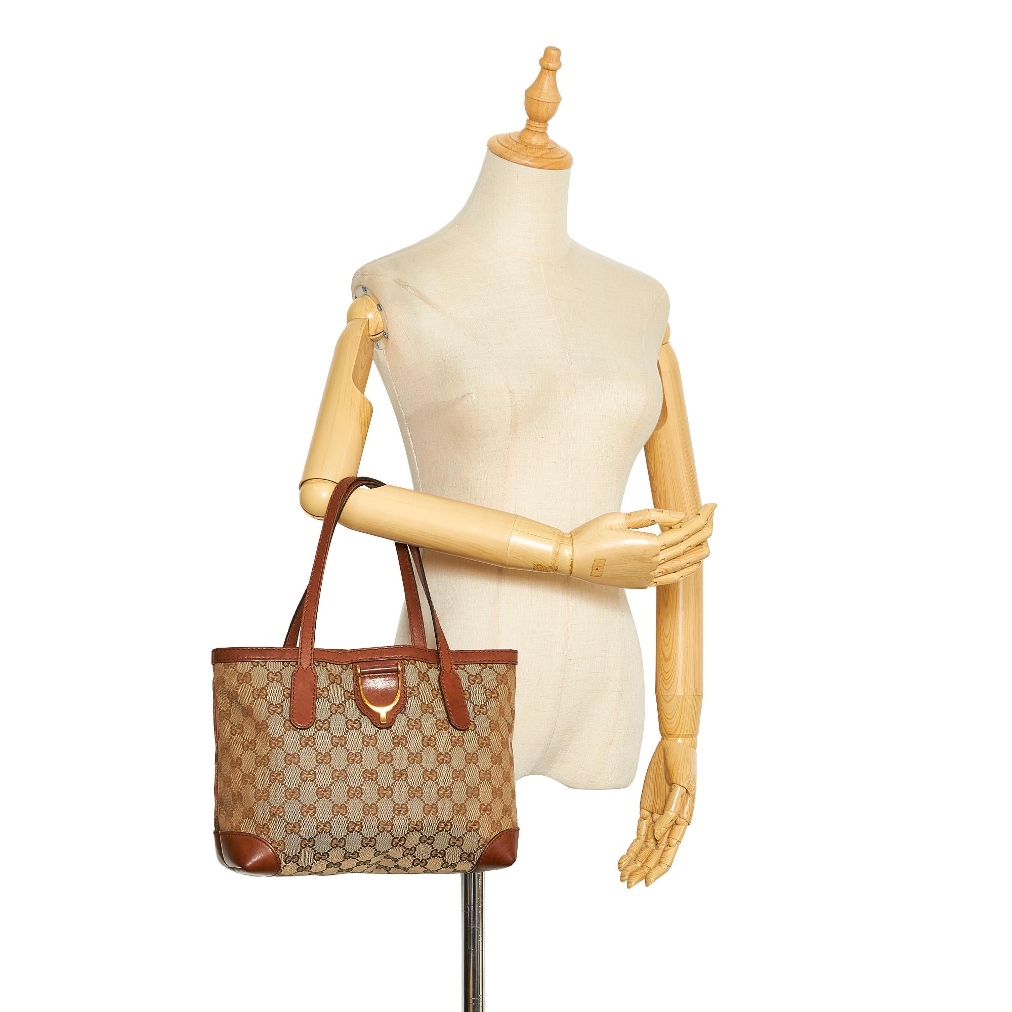 Gucci GG Canvas Stirrup Handbag (SHG-4H8XJO)