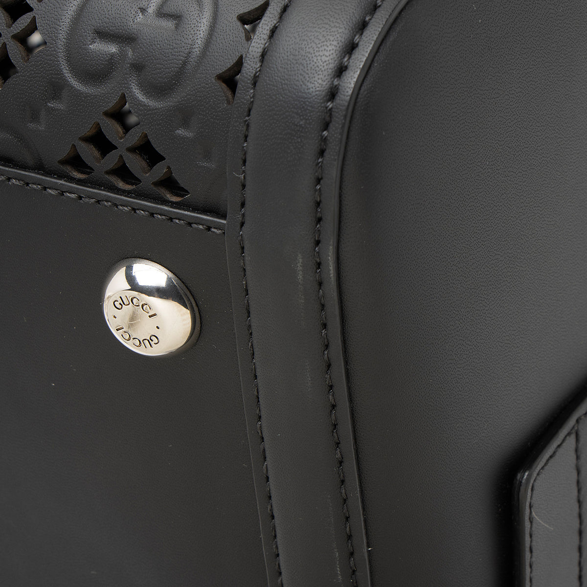 Gucci Perforated GG Embossed Leather Medium Duffle