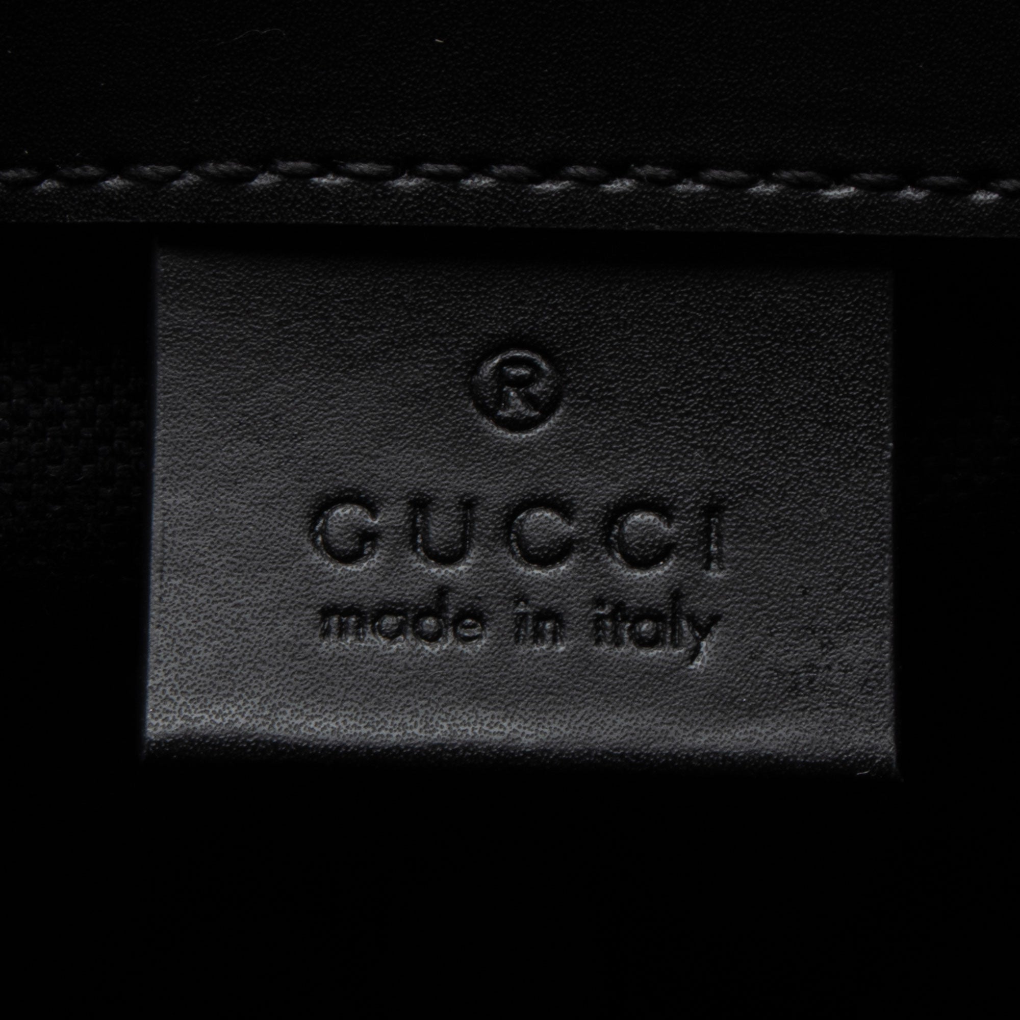 Gucci GG Supreme Medium Flap Backpack