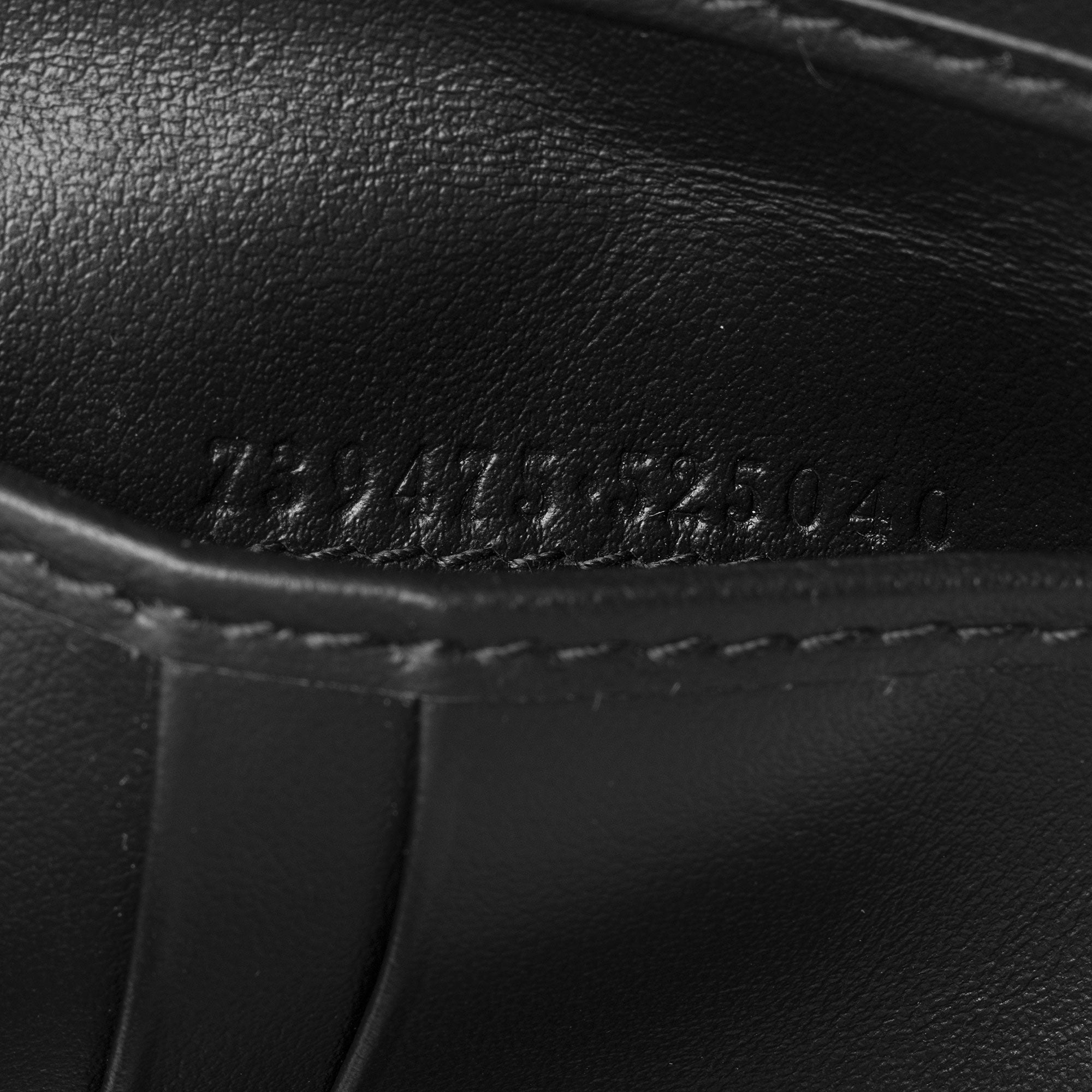 Gucci Jumbo GG Embossed Leather Bifold Wallet