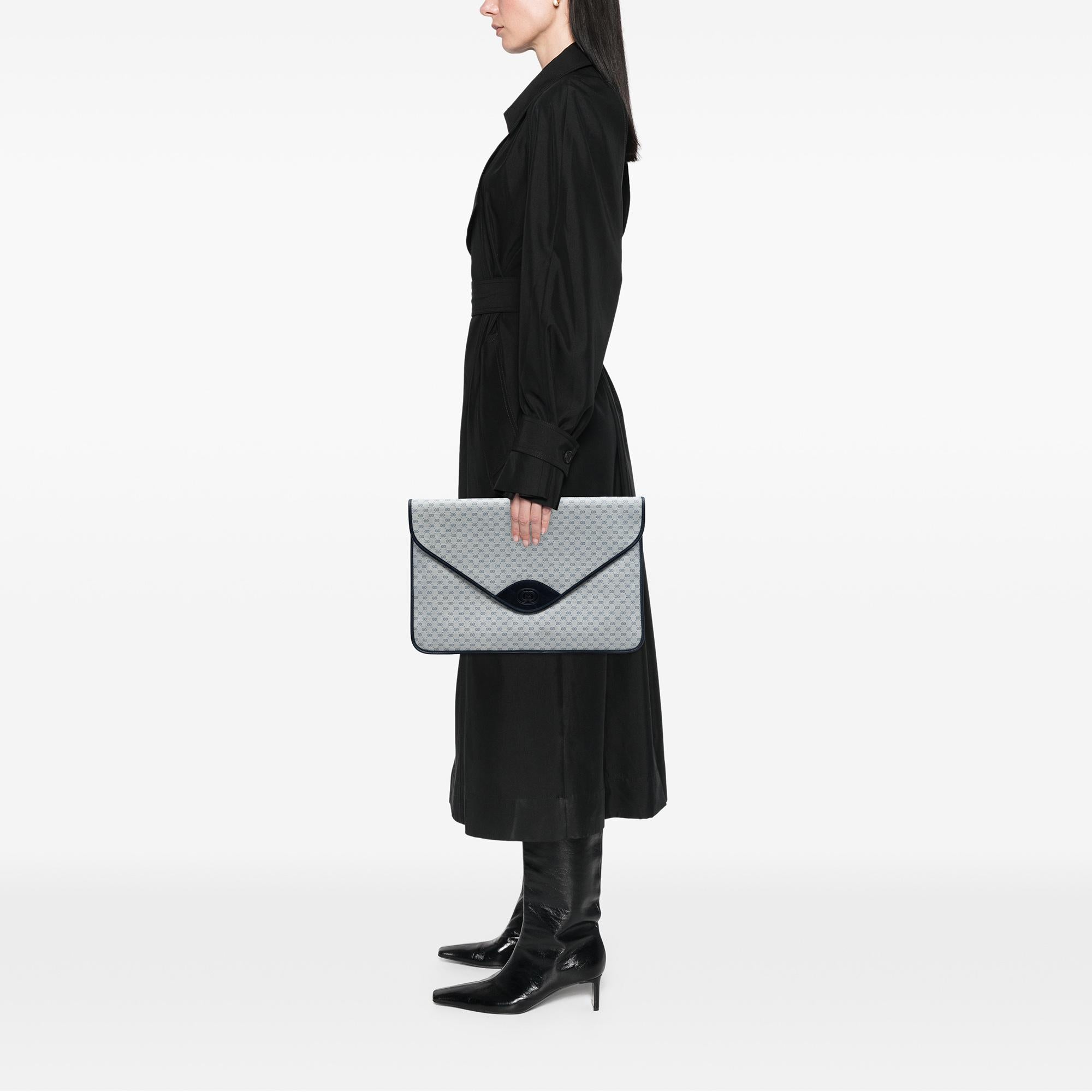 Gucci Micro GG Supreme Clutch
