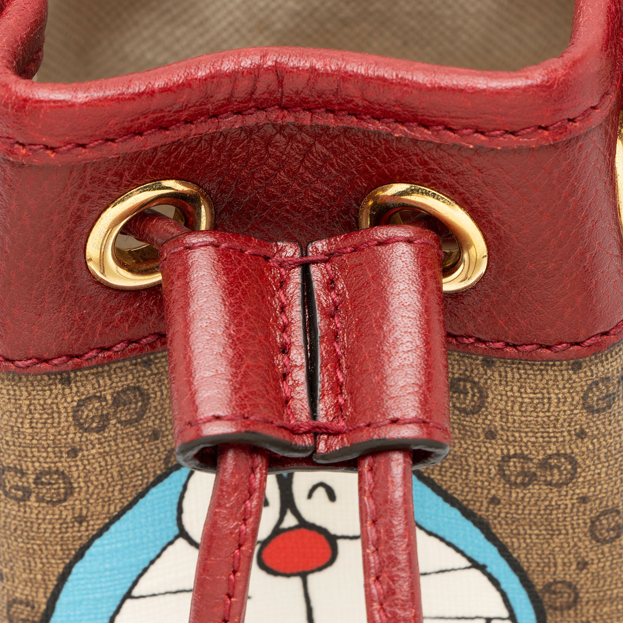 Gucci x Doraemon Micro GG Canvas Mini Bucket Bag