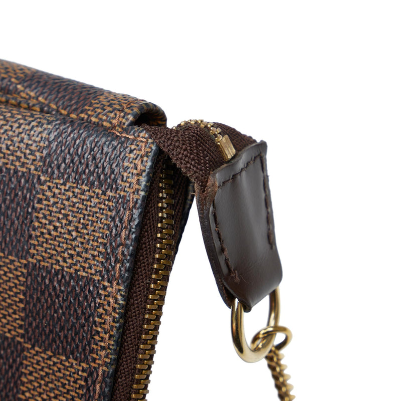 Louis Vuitton Limited Edition Damier Ebene Big Wheel Mini Pochette Acc –  LuxeDH