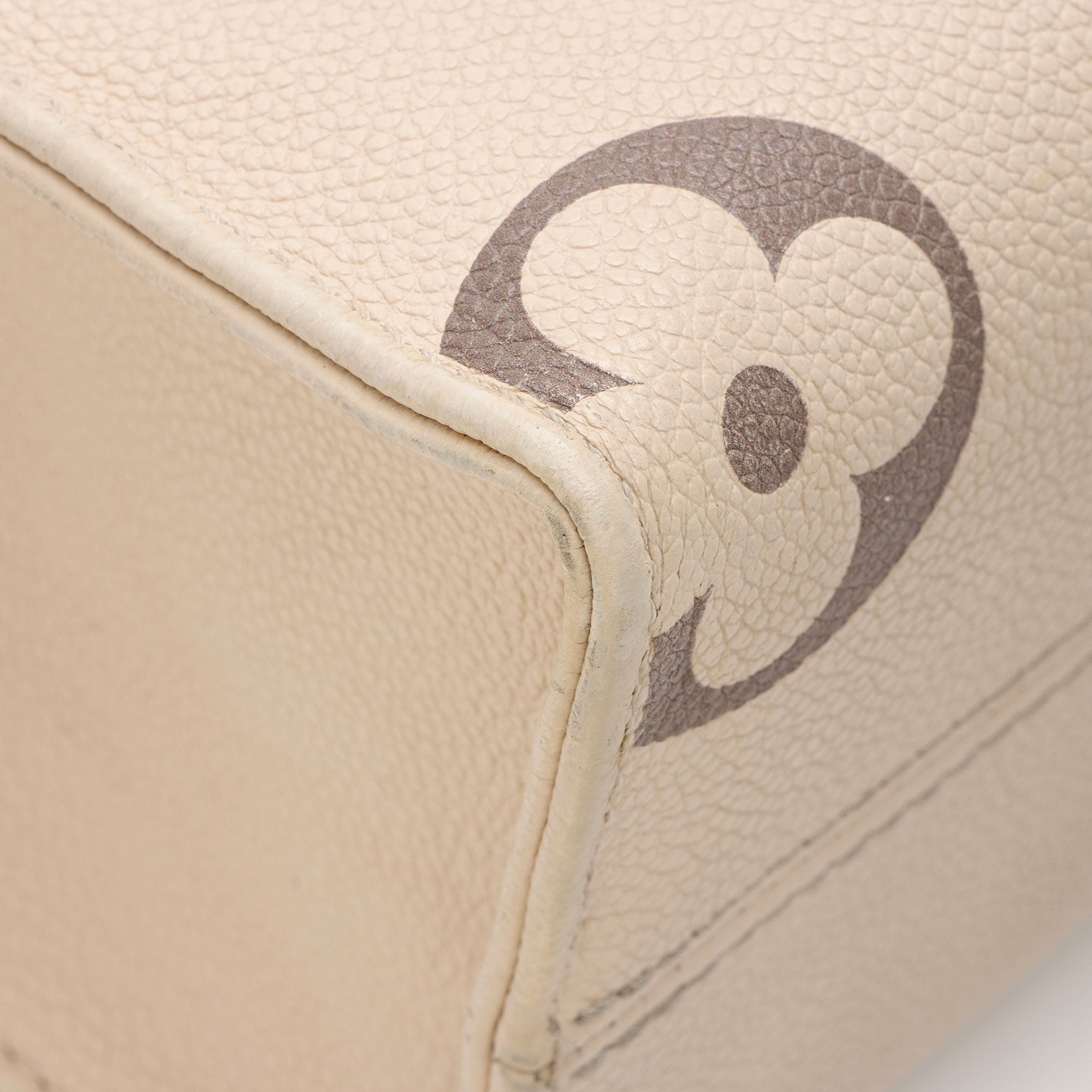 Louis Vuitton Giant Monogram Empreinte Bicolor Onthego PM Tote