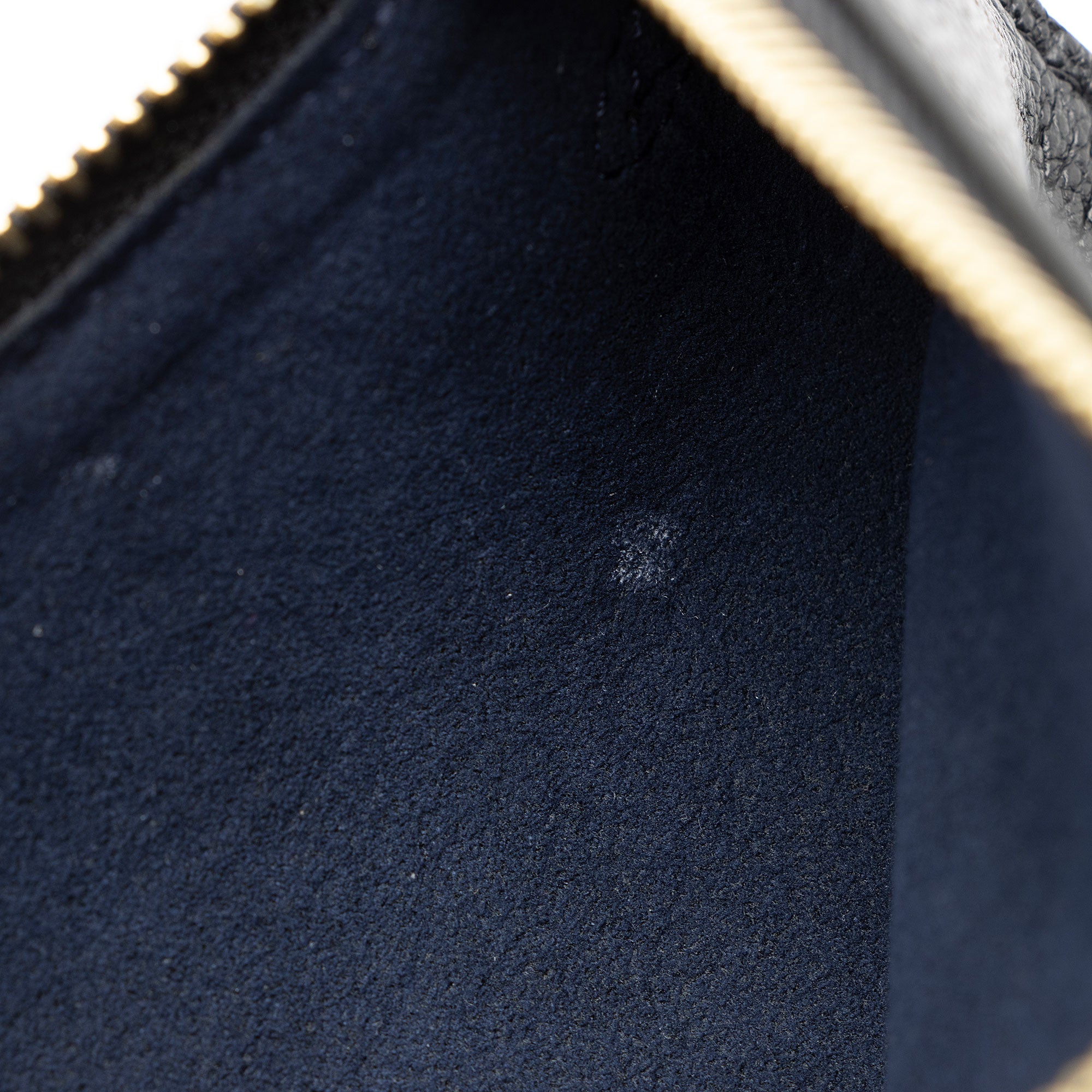 Louis Vuitton Giant Monogram Empreinte Neverfull MM Pochette (SHF-uMpZHz)