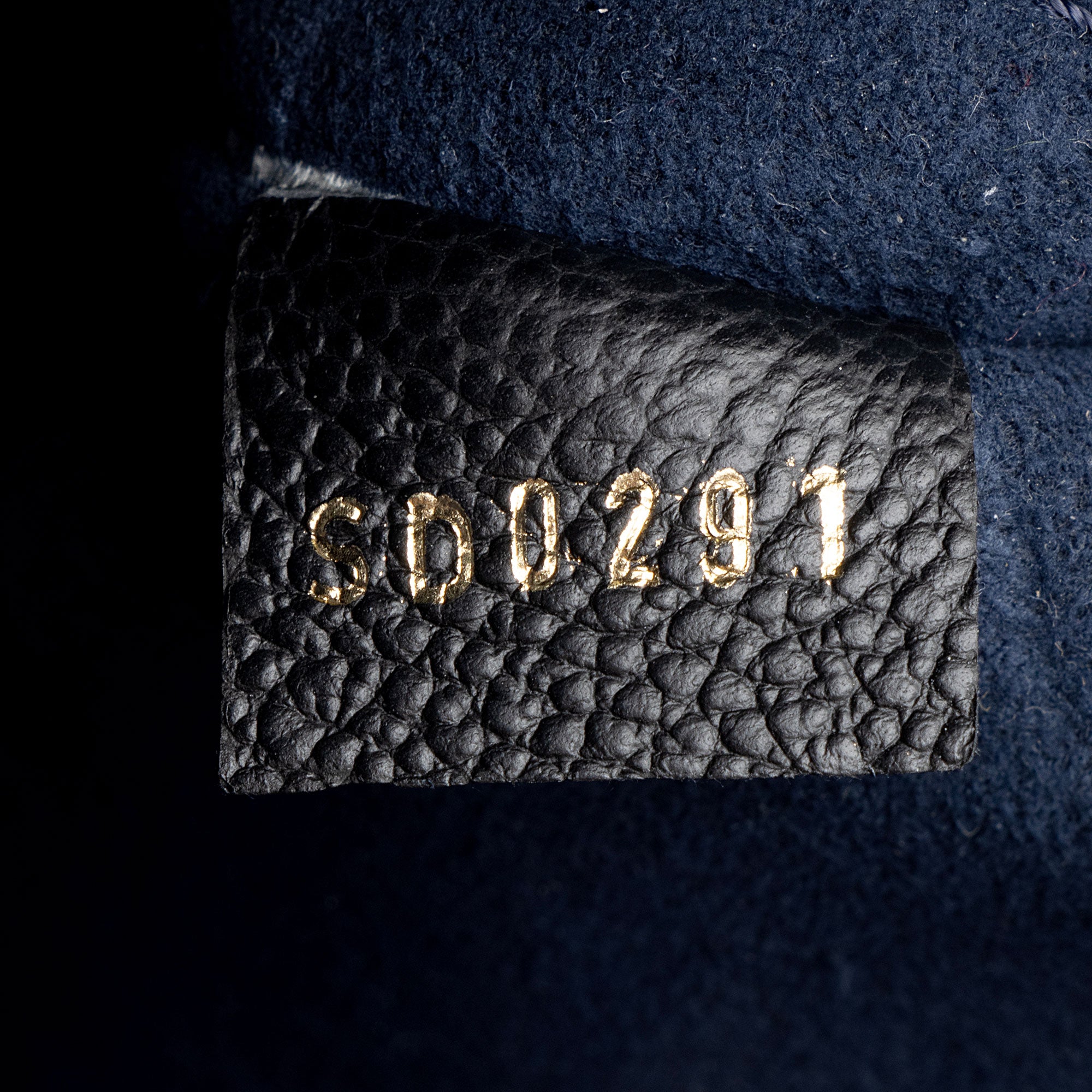 Louis Vuitton Giant Monogram Empreinte Neverfull MM Pochette