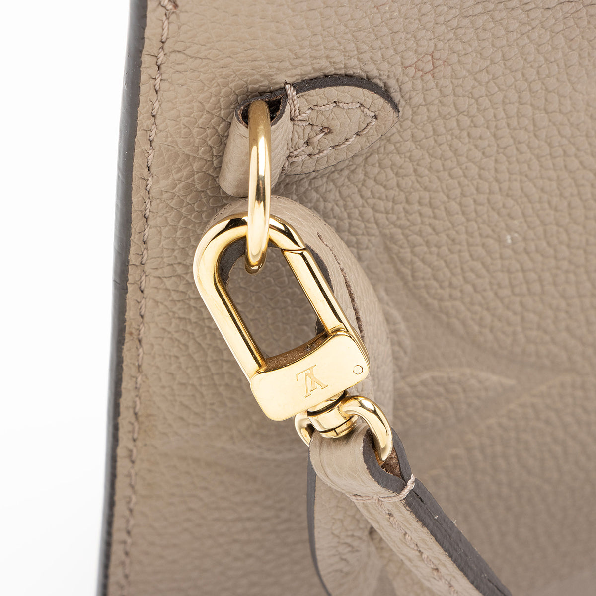 Louis Vuitton Giant Monogram Empreinte Neverfull MM Pochette