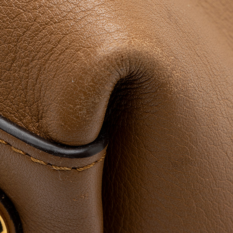 A brown Saffiano leather messenger bag, Circa 2018, Fine Watches, 2023