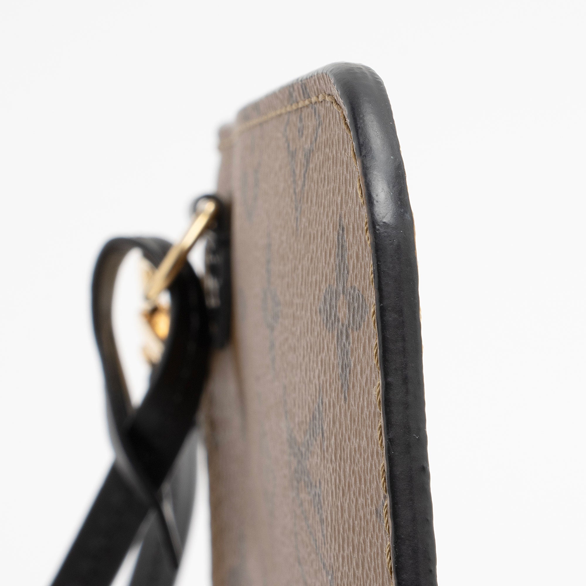 Louis Vuitton Limited Edition Reverse Monogram Canvas Kabuki Pochette (SHF-9VUPm7)