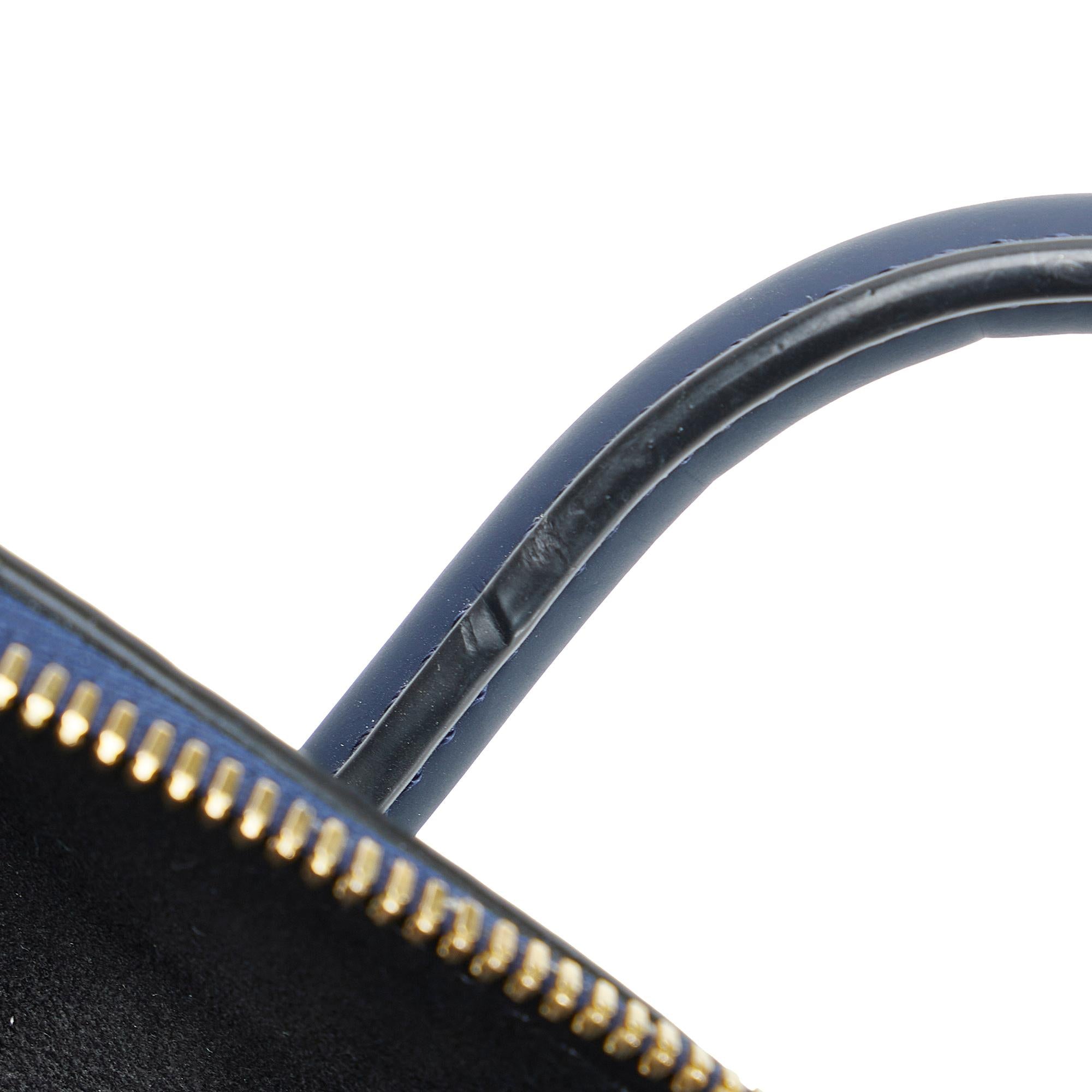 Louis Vuitton Monogram Addiction Lockit Vertical MM (SHG-AMrldH)