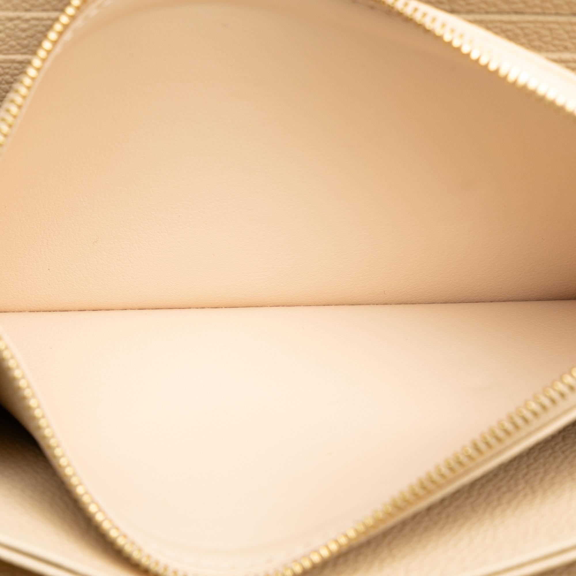 Louis Vuitton Monogram Bicolor Empreinte Giant Zippy Wallet (SHG-vdEWPa)