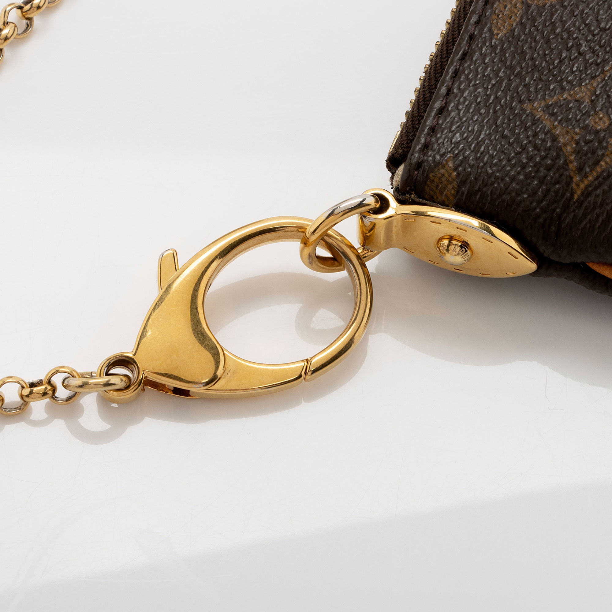 Louis Vuitton Monogram Canvas Milla MM Pochette (SHF-SUsMut)