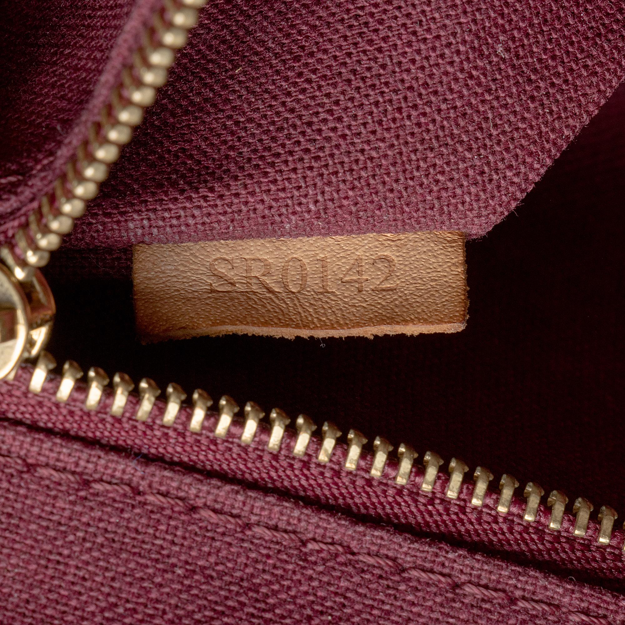 Louis Vuitton Monogram Canvas Raspail MM Tote (SHF-lu0gtR)