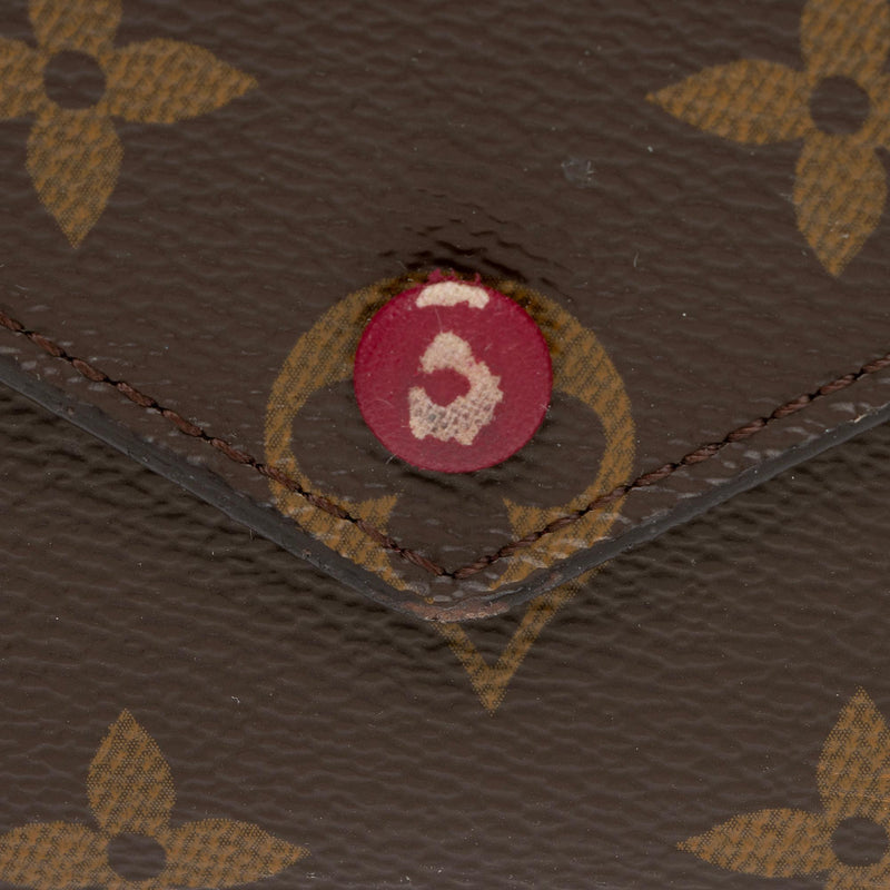 louis vuitton wallet with red button