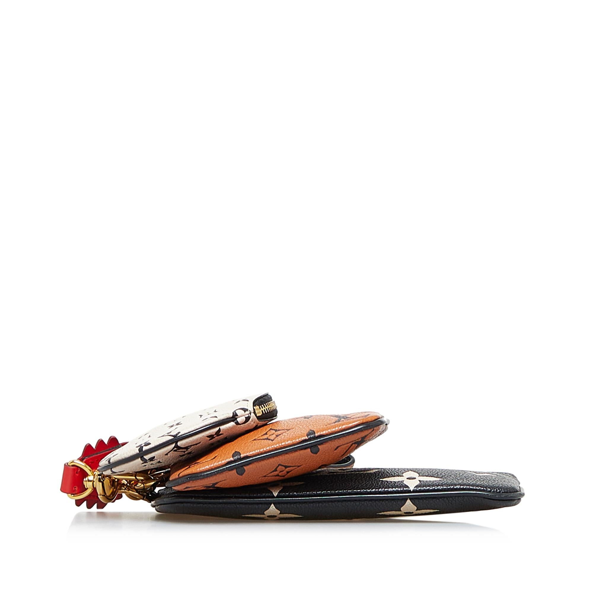 Louis Vuitton Monogram Empreinte Crafty Pochette Trio (SHG-MwMAYb)