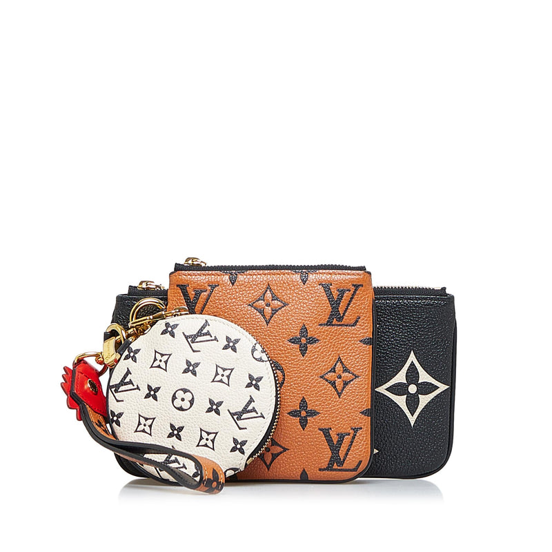The New Louis Vuitton Monogram Trio Pouch Lets You Have 3 Wallets For The  Price Of 1 