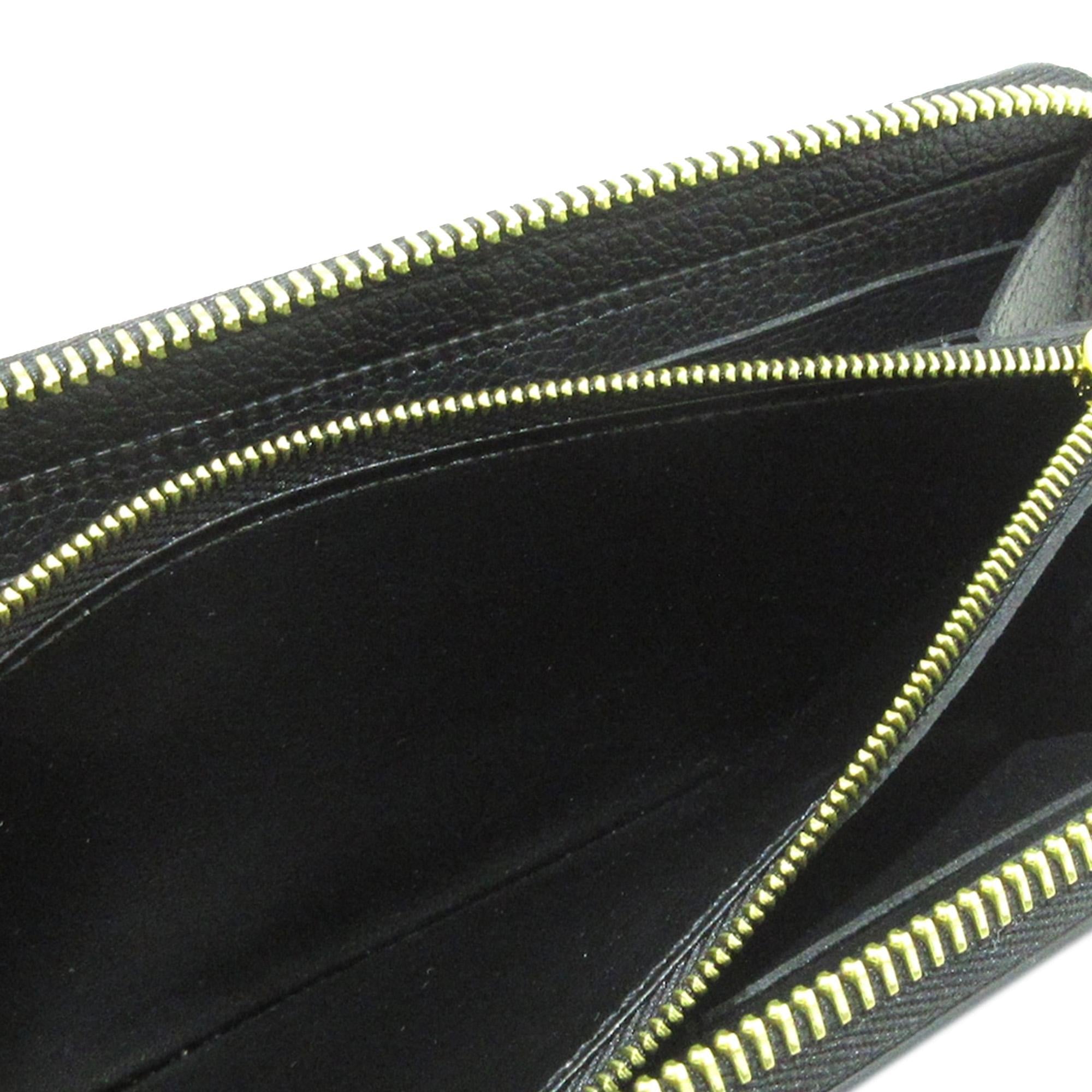 Louis Vuitton Monogram Empreinte Giant Zippy Wallet (SHG-MHxJZ4)